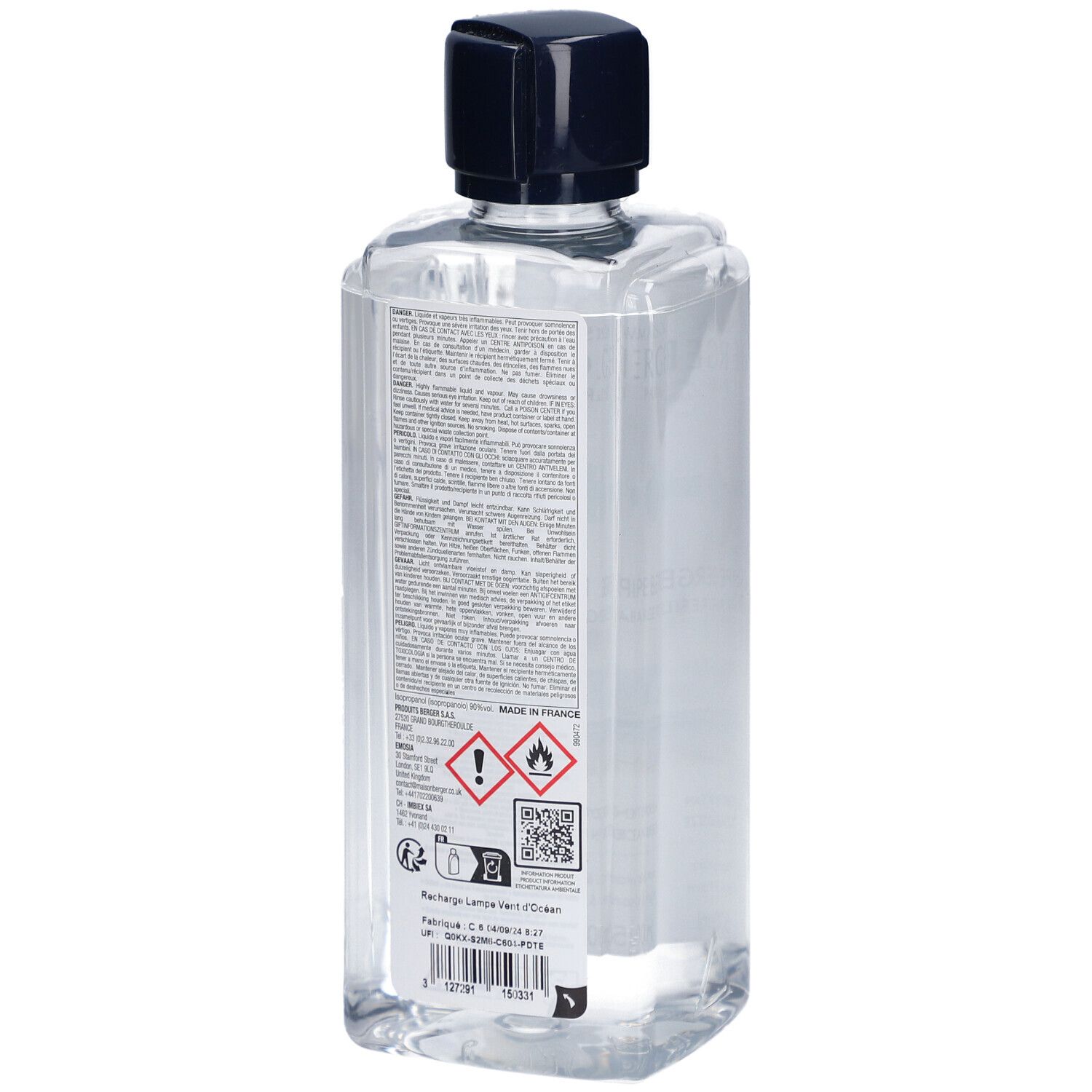 Dos d'une bouteille avec liquide clair et bouchon noir. Texte et avertissements sur l'étiquette.