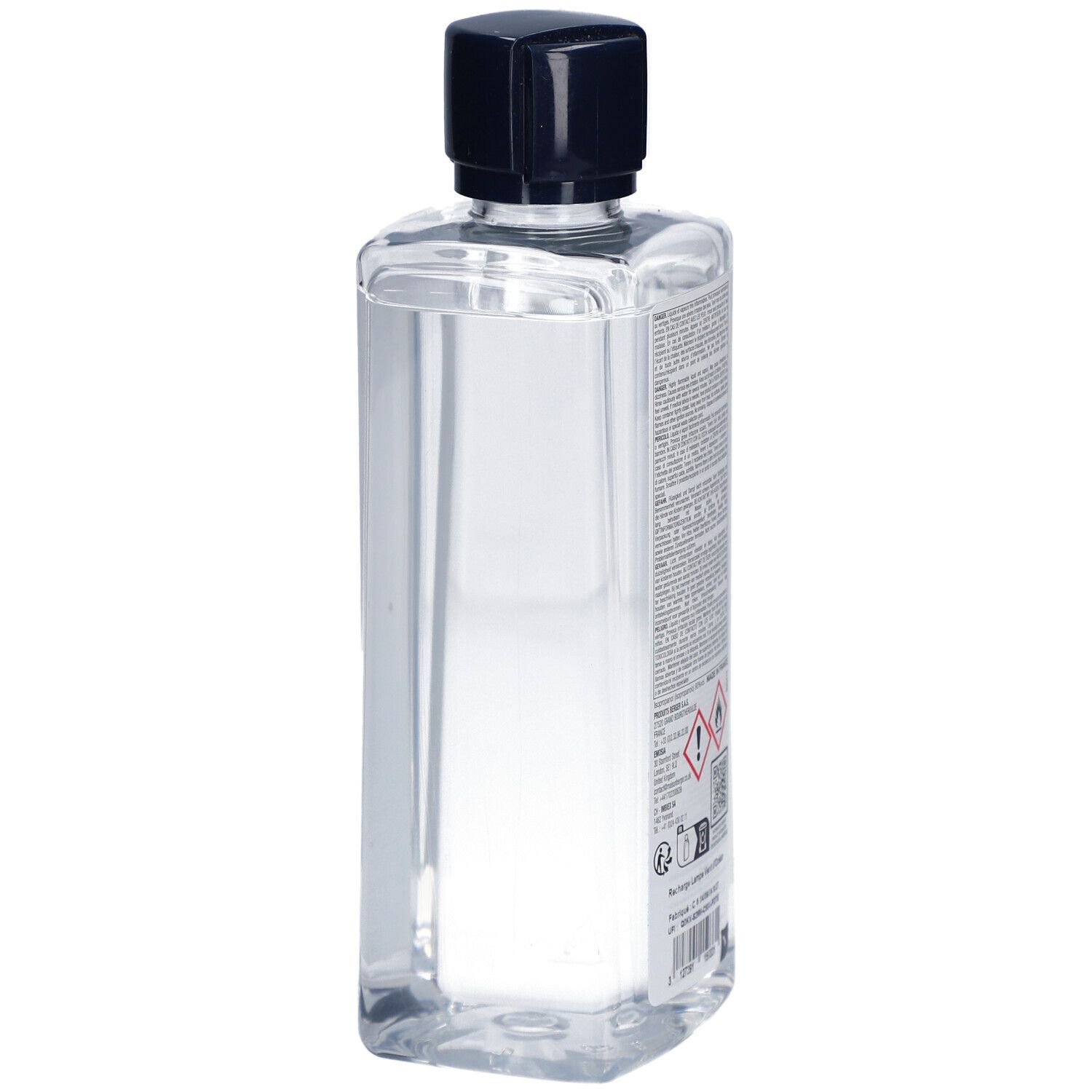 Bouteille rectangulaire avec liquide clair et bouchon noir. Texte et avertissements sur l'étiquette.