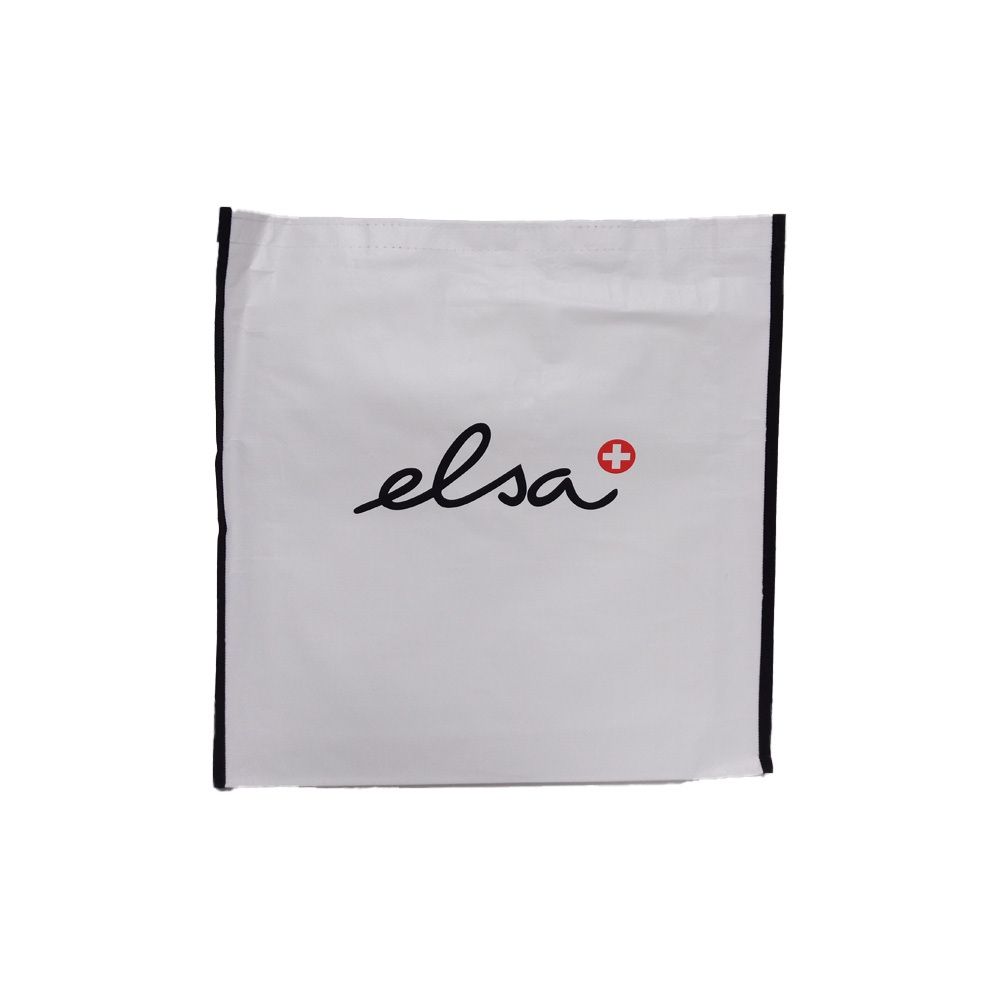 Witte tas met zwarte rand. Op de tas staat de tekst "elsa" in zwart, met een rood kruis.