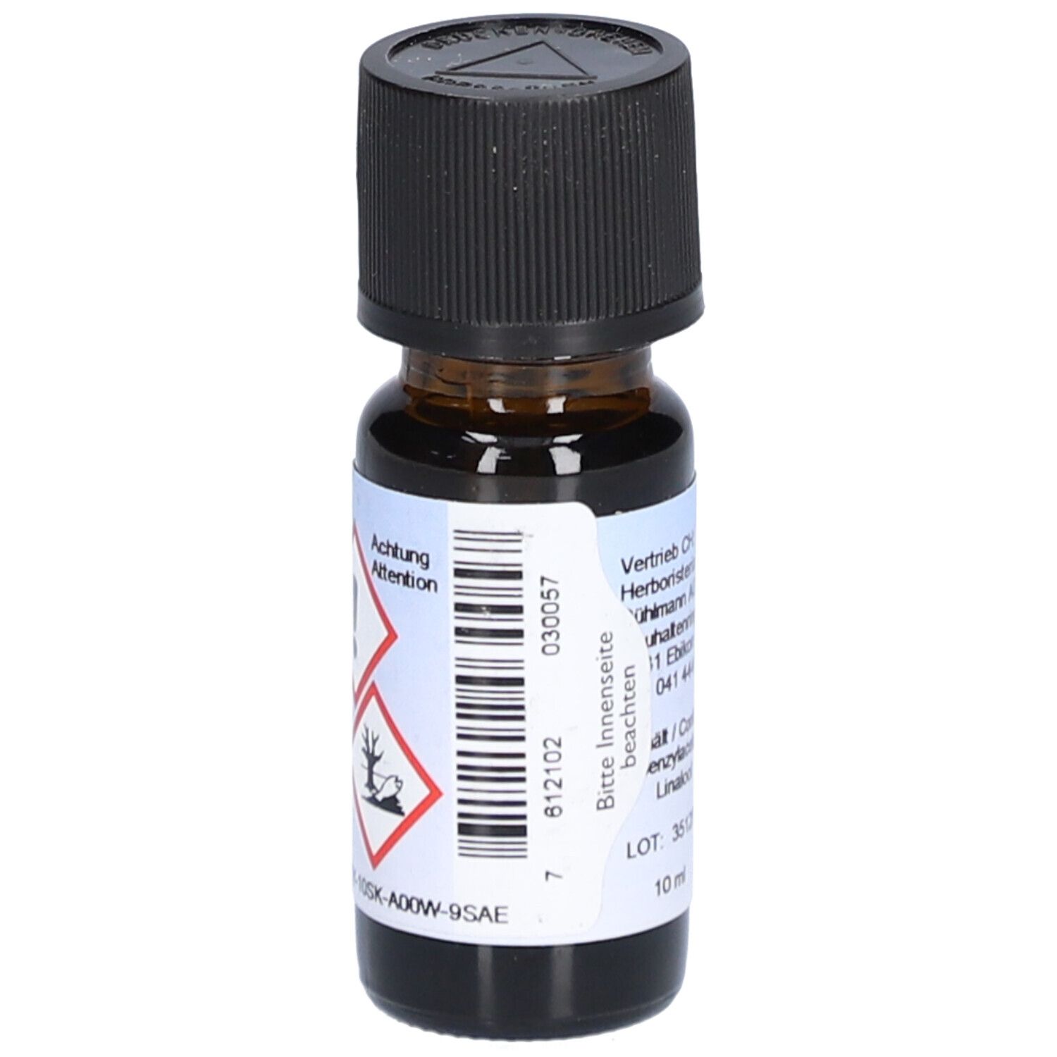 Flacon en verre brun avec bouchon noir. Étiquette avec symboles de danger et code-barres. Marque: HERBORISTERIA.