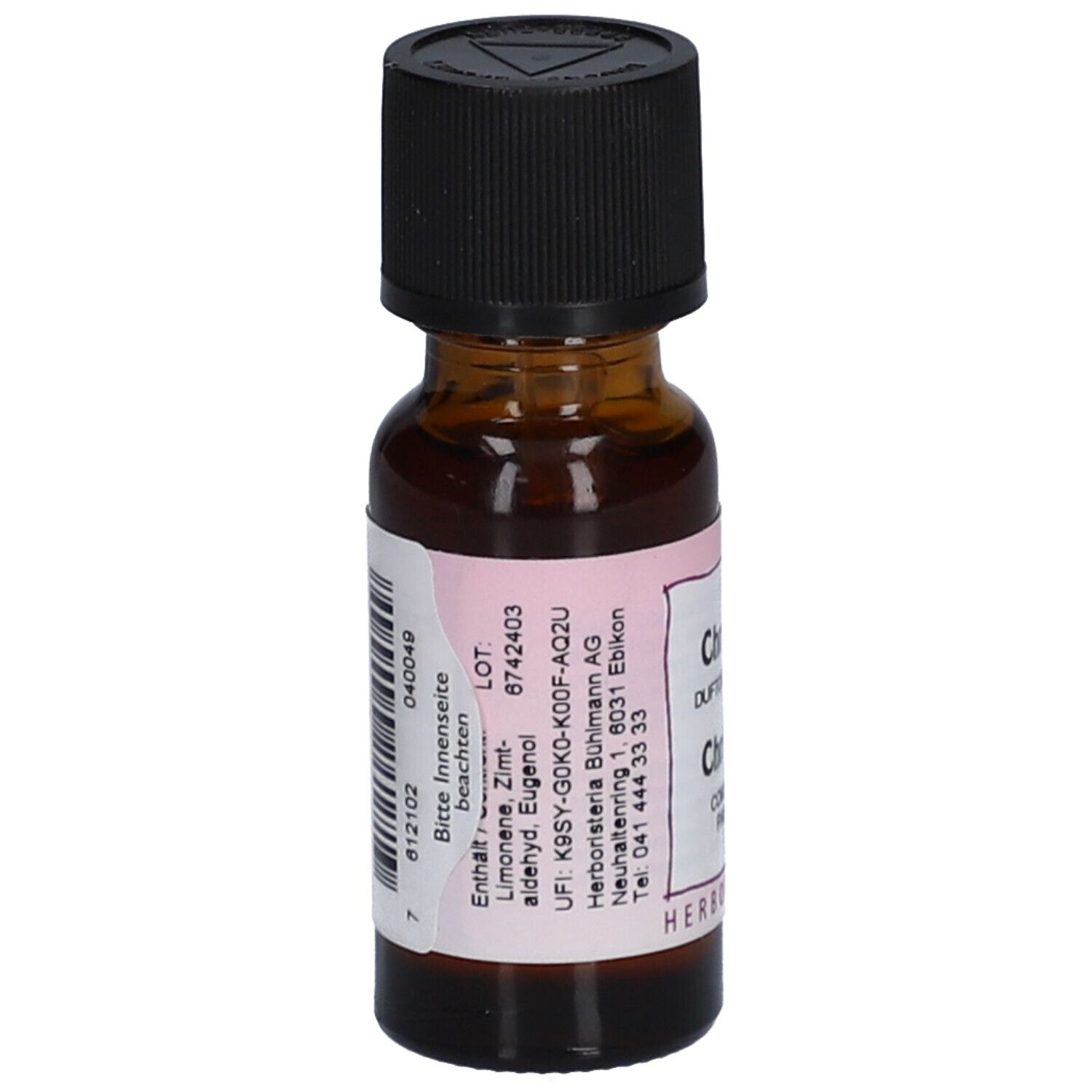 Flacon en verre brun avec bouchon noir. Étiquette avec ingrédients et numéro de lot.