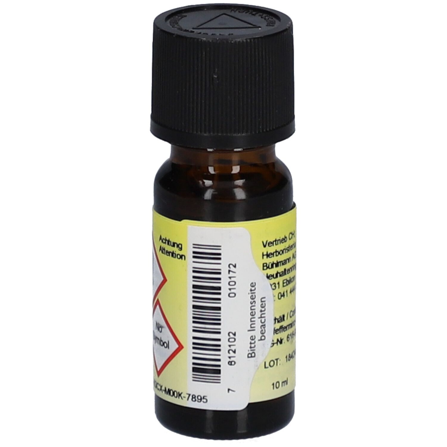 Bruine glazen fles met zwarte dop en geel etiket. Waarschuwingen en lotnummer zichtbaar.
