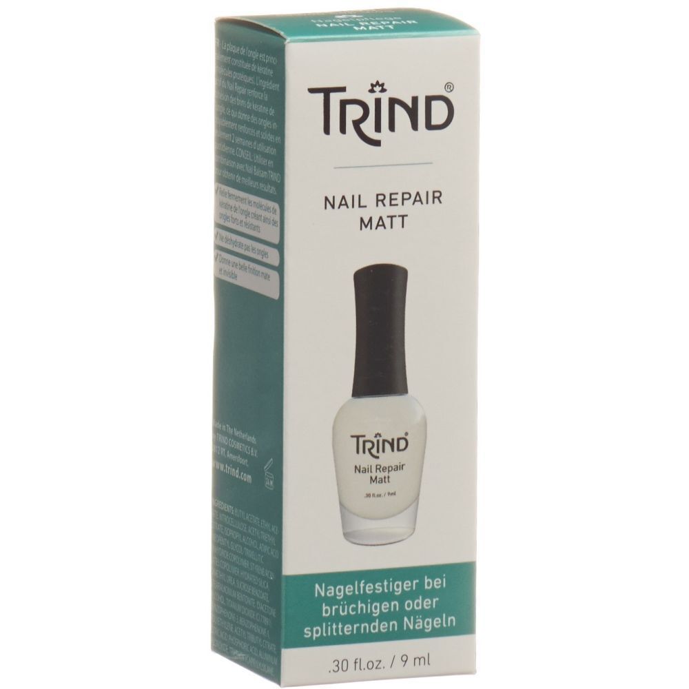 Doos met nagellakfles. Opschrift: TRIND, Nail Repair Matt. Fles met zwarte dop, witte lak.