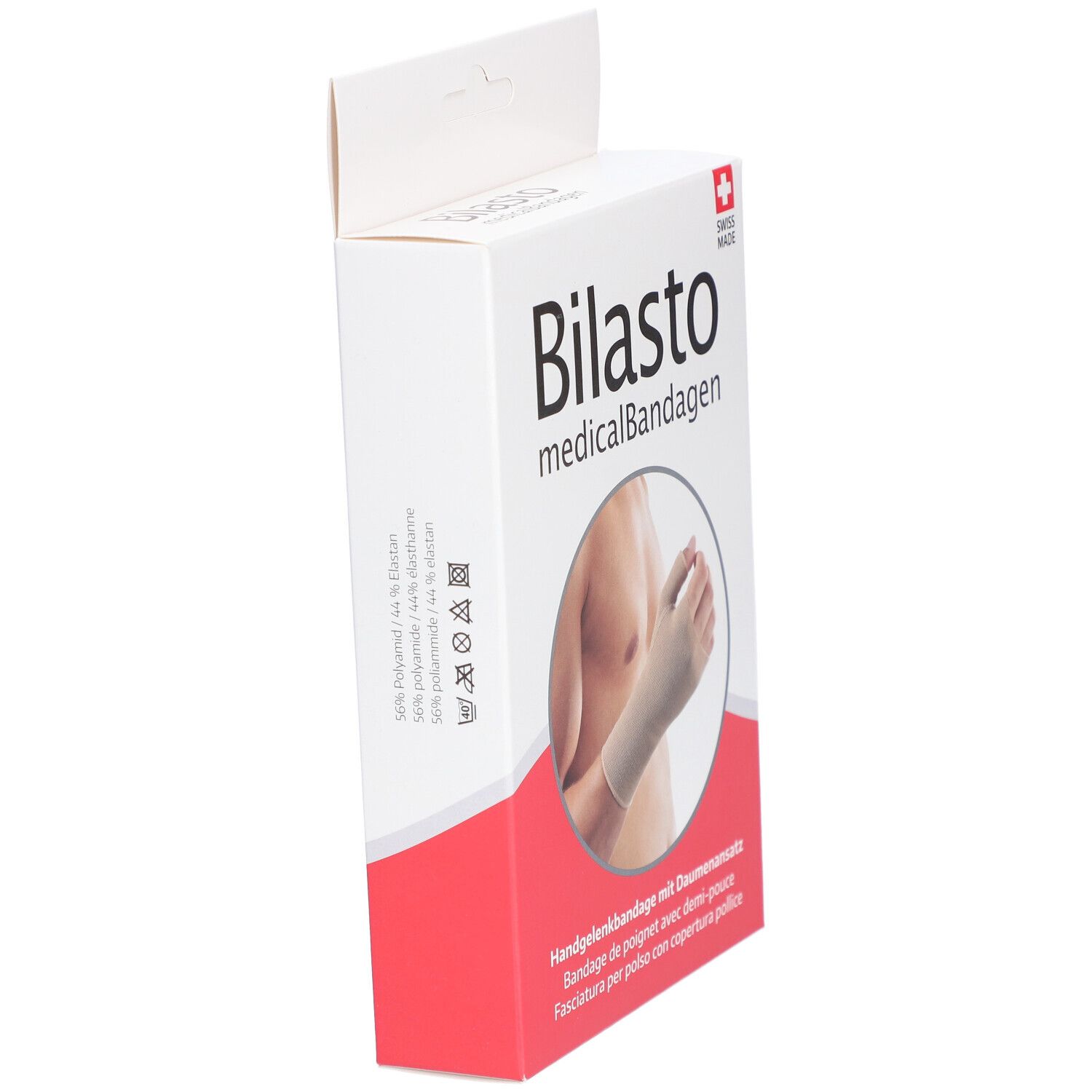 Open verpakking van polsbandage met duimsteun. Merk Bilasto, Swiss Made. Beige bandage op een pols.