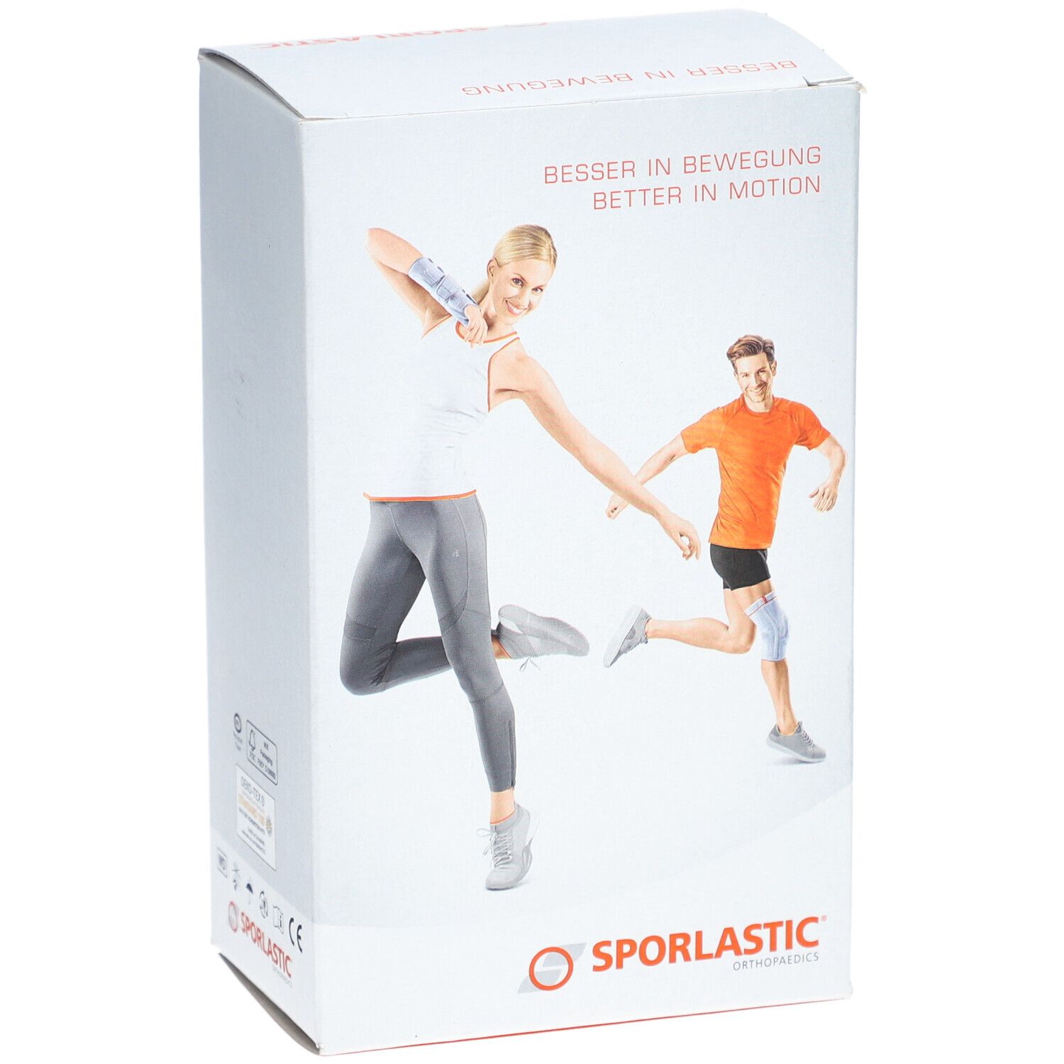 Productverpakking met afbeeldingen van mensen met bandages. Merk SPORLASTIC. Tekst: BESSER IN BEWEGUNG / BETTER IN MOTION.
