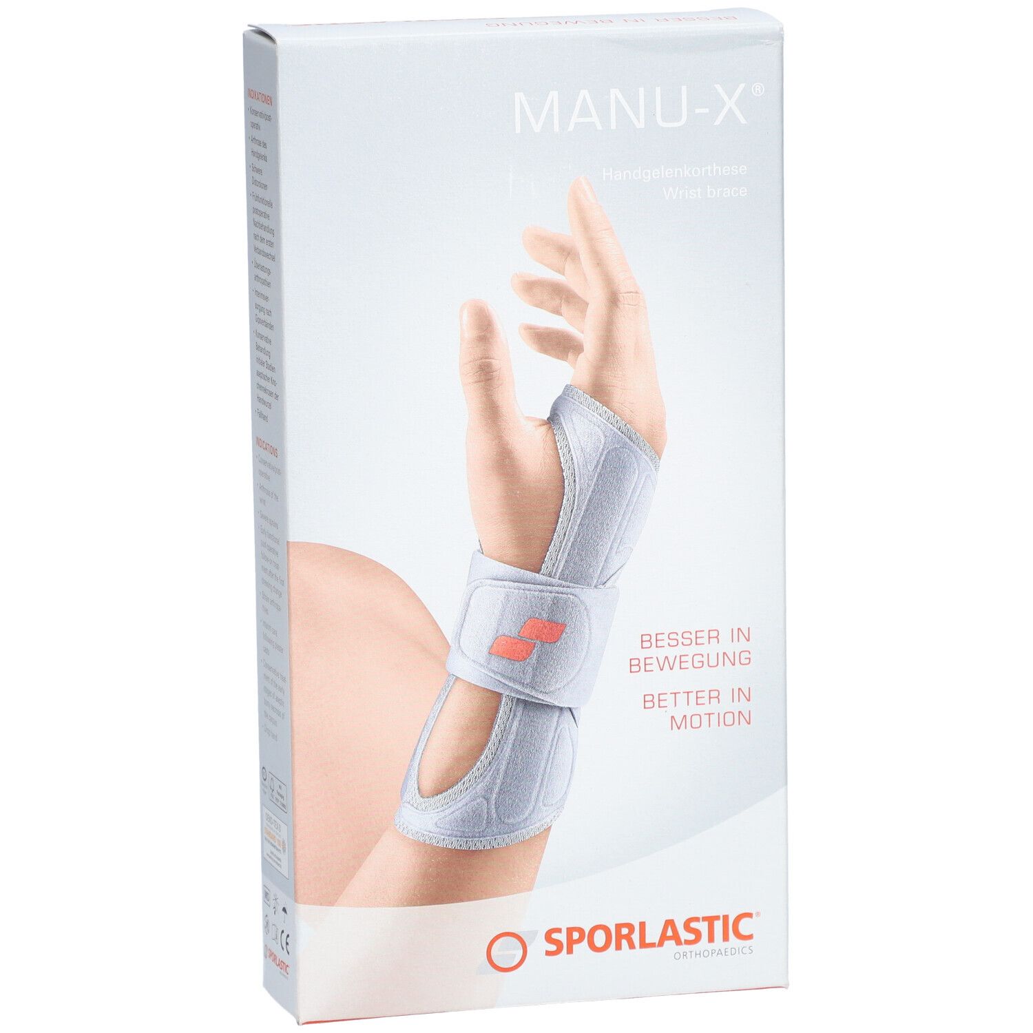 Verpakking van de polsbrace MANU-X. Toont een hand met brace. Merk SPORLASTIC. Tekst: BESSER IN BEWEGUNG, BETTER IN MOTION.