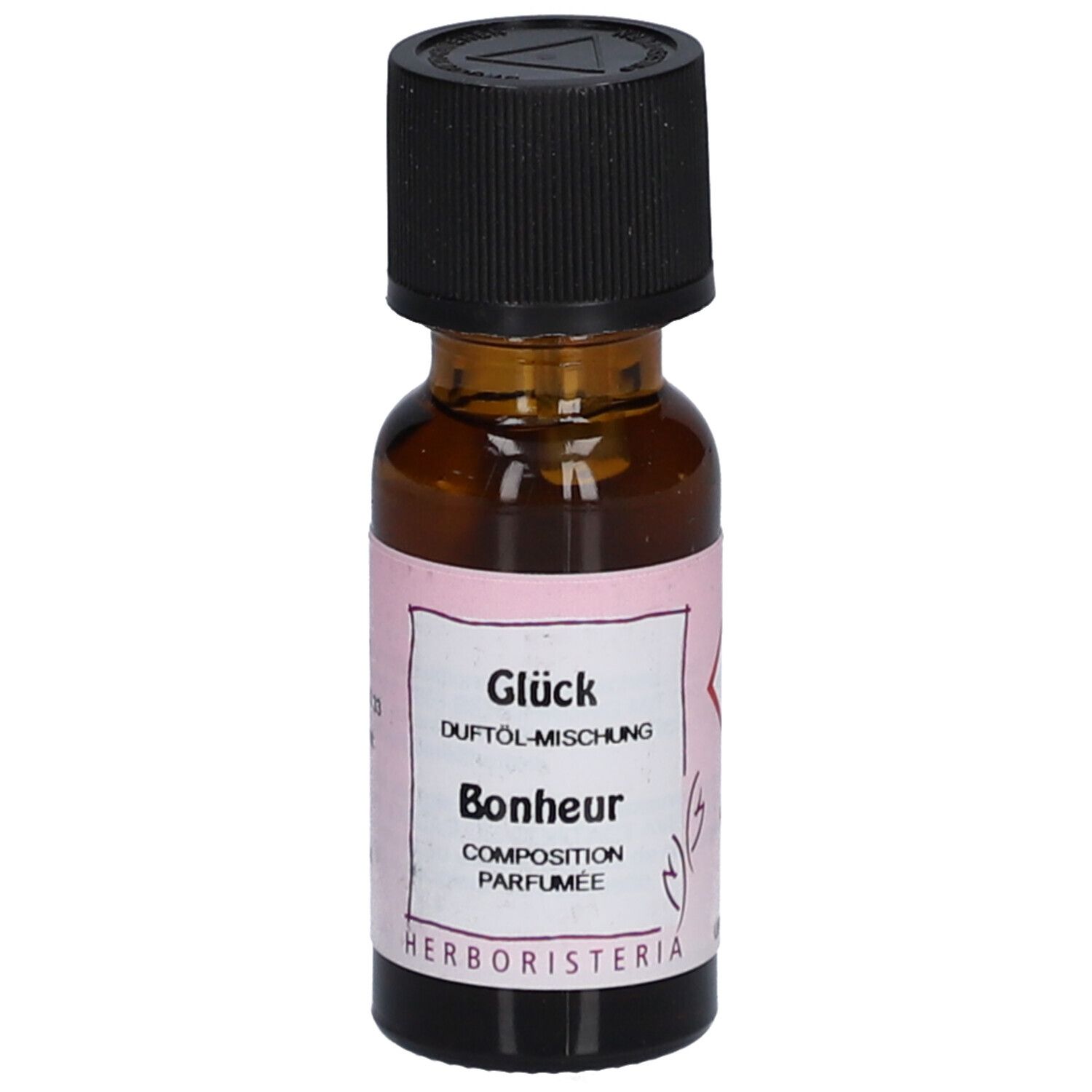Bruine glazen fles met zwarte dop. Etiket met tekst: Glück, Duftöl-Mischung, Bonheur, Composition Parfumée. Merk: HERBORISTERIA.