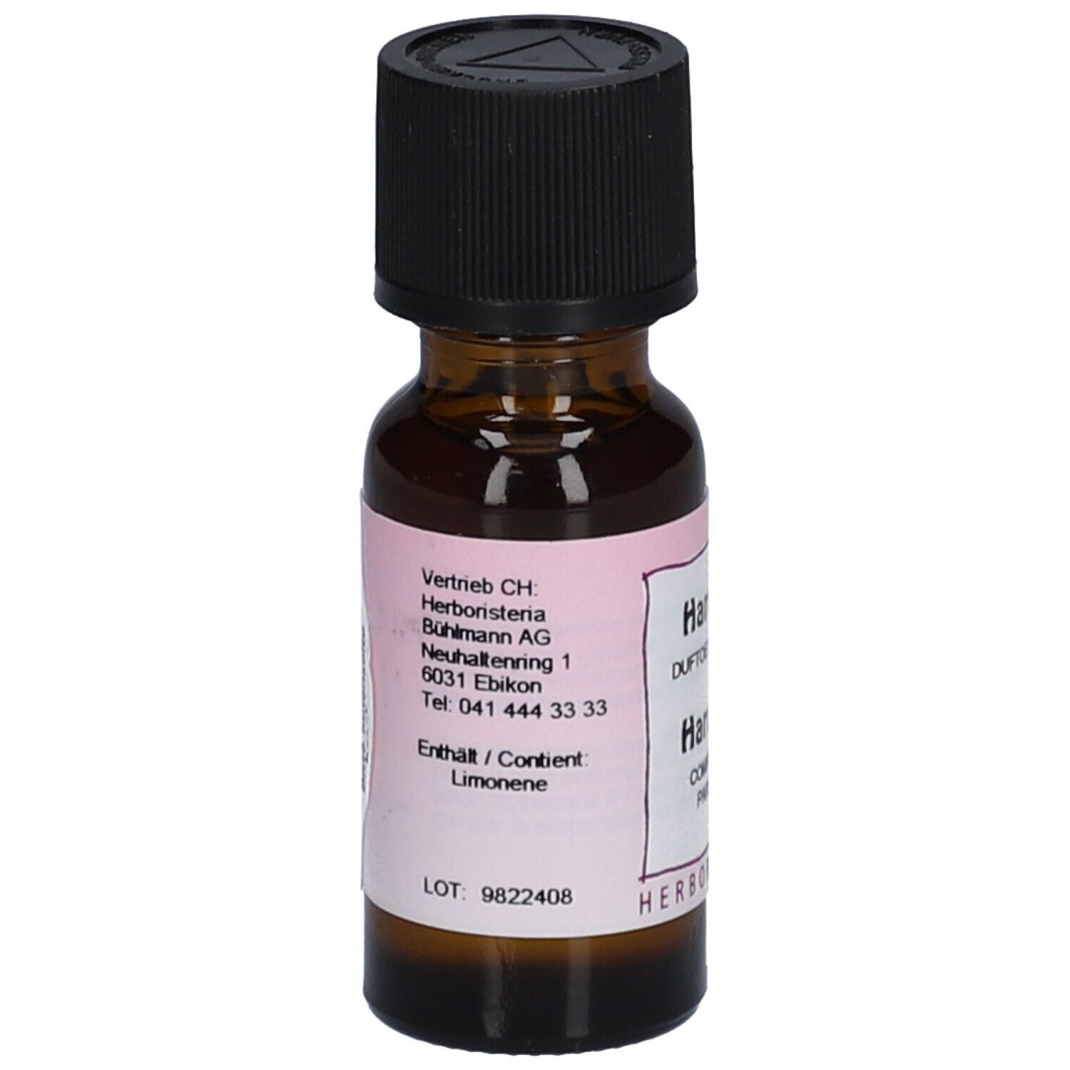 Flacon en verre brun avec bouchon noir. Étiquette rose avec texte et adresse de Herboristeria.