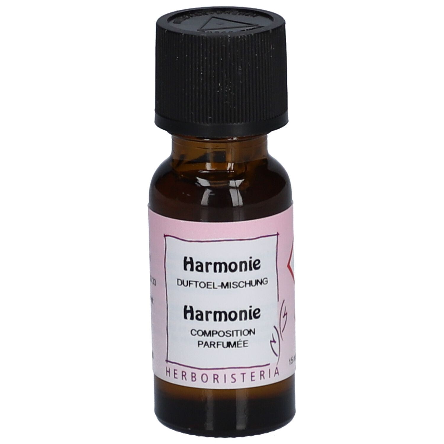 Flacon en verre brun avec bouchon noir. Étiquette rose avec texte: Harmonie, Duftöl-Mischung, HERBORISTERIA.