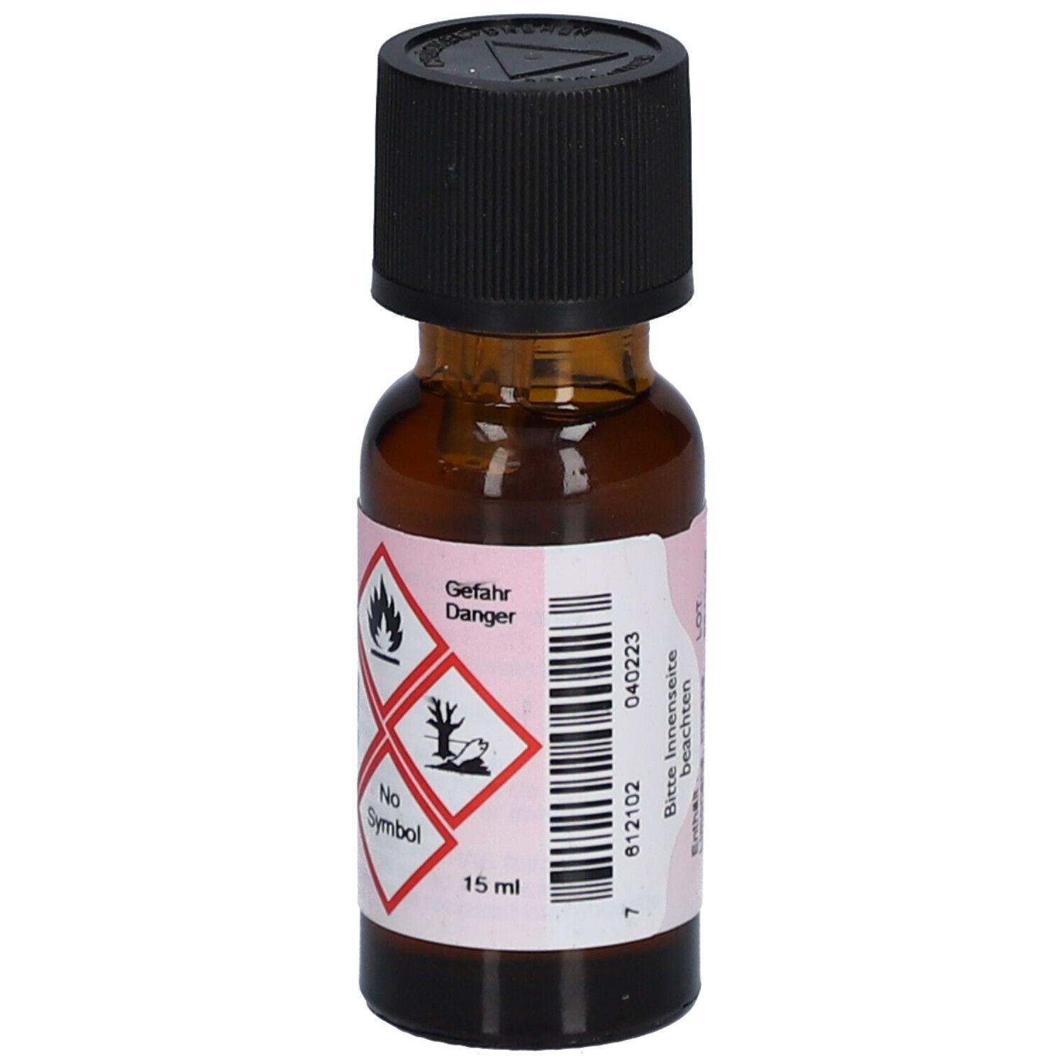 Bruine glazen fles met zwarte dop. Etiket met gevaarsymbolen en volume: 15 ml.