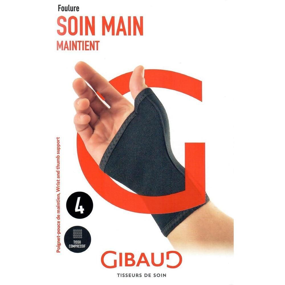 Orthèse de maintien main, gris foncé, portée sur la main. Marque GIBAUD. Texte: SOIN MAIN MAINTIENT, Poignet-pouce de maintien, Wrist and thumb support.