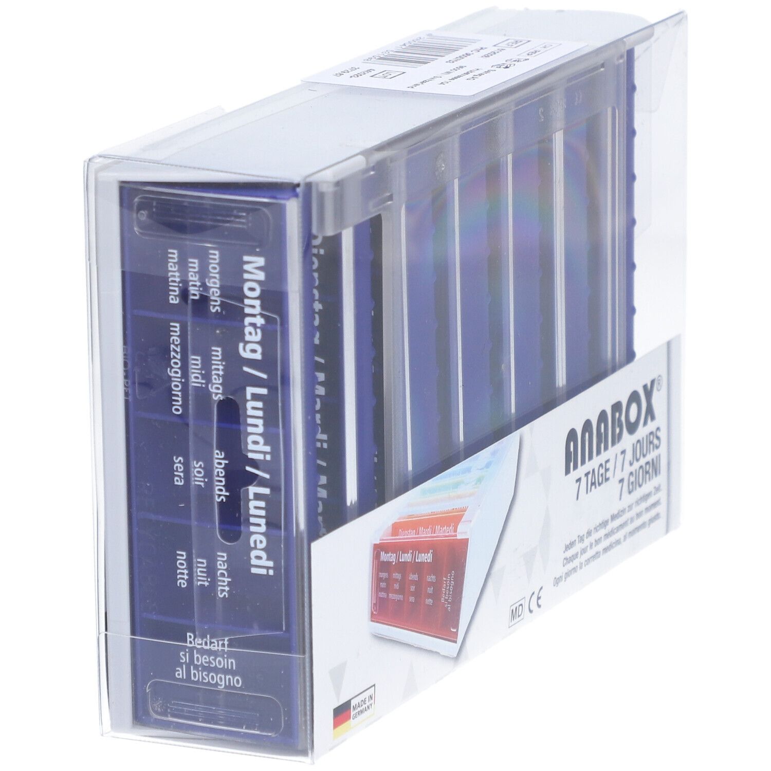 Distributeur de médicaments ANABOX dans son emballage. Compartiments bleus avec jours et heures. Emballage transparent.