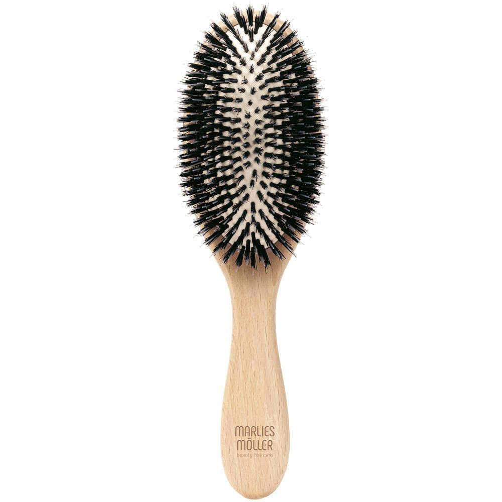Brosse à cheveux ovale, manche en bois. Soies noires. Marque Marlies Möller.