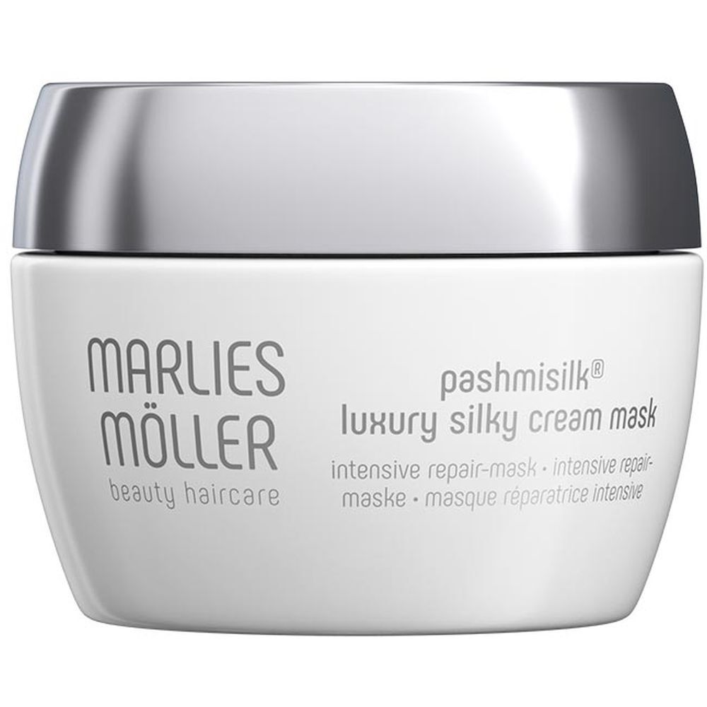 Pot blanc à couvercle argenté. Inscription: Marlies Möller, Pashmisilk, Luxury Silky Cream Mask.
