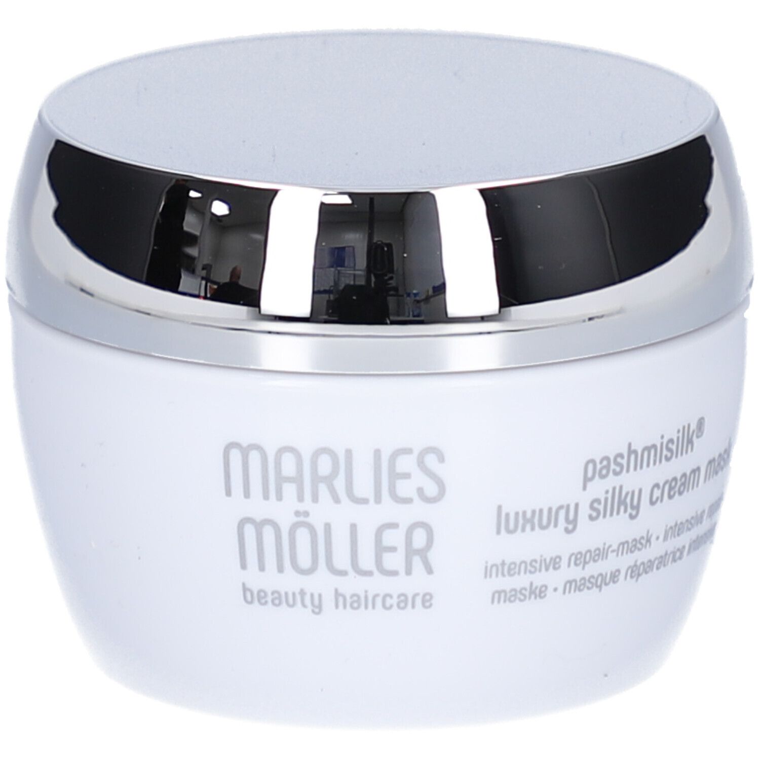 Pot blanc à couvercle argenté. Inscription: Marlies Möller, Pashmisilk, Luxury Silky Cream Mask.