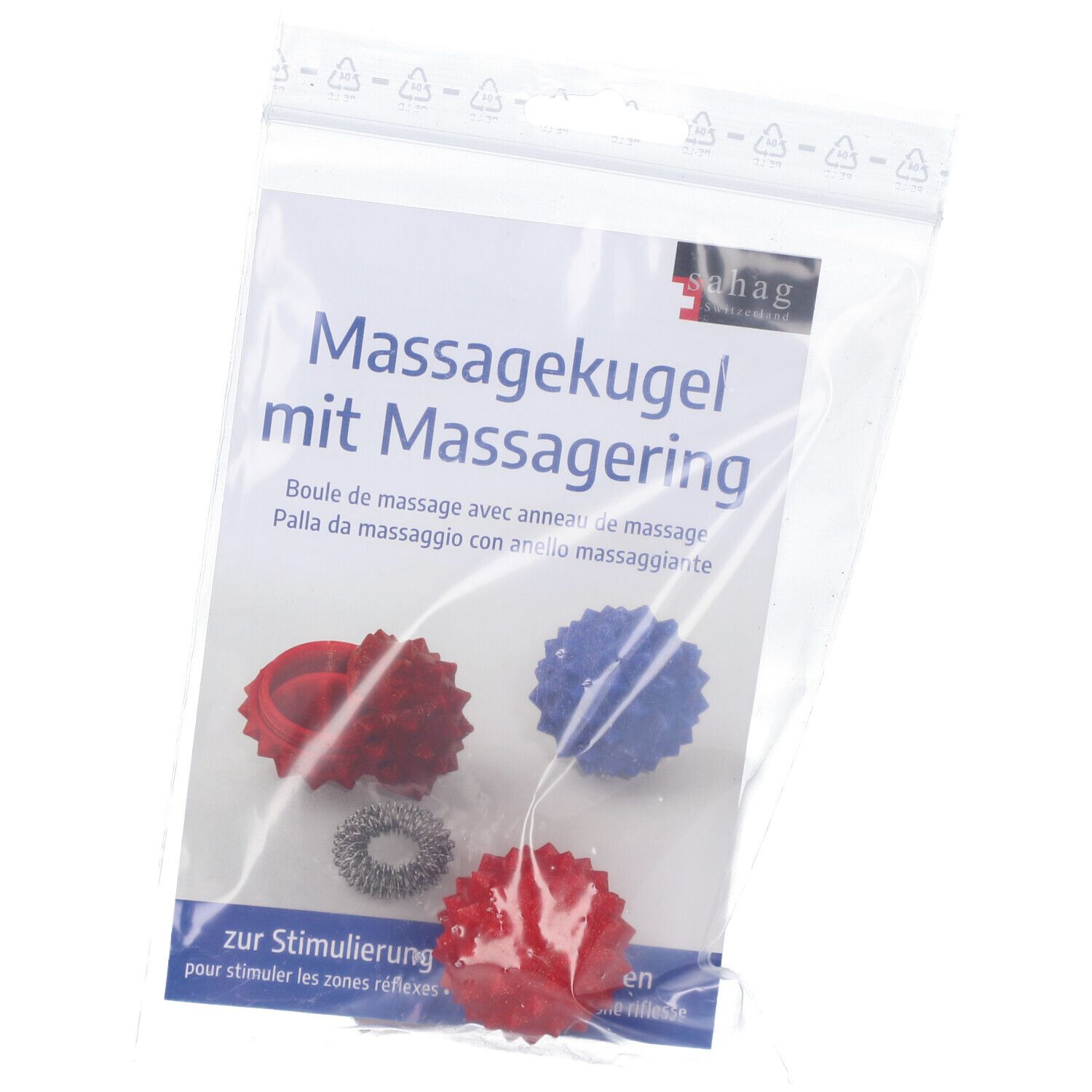 Boules de massage et anneau de massage dans un emballage plastique. Boules rouges, bleues et un anneau argenté. Texte: Massagekugel mit Massagering.