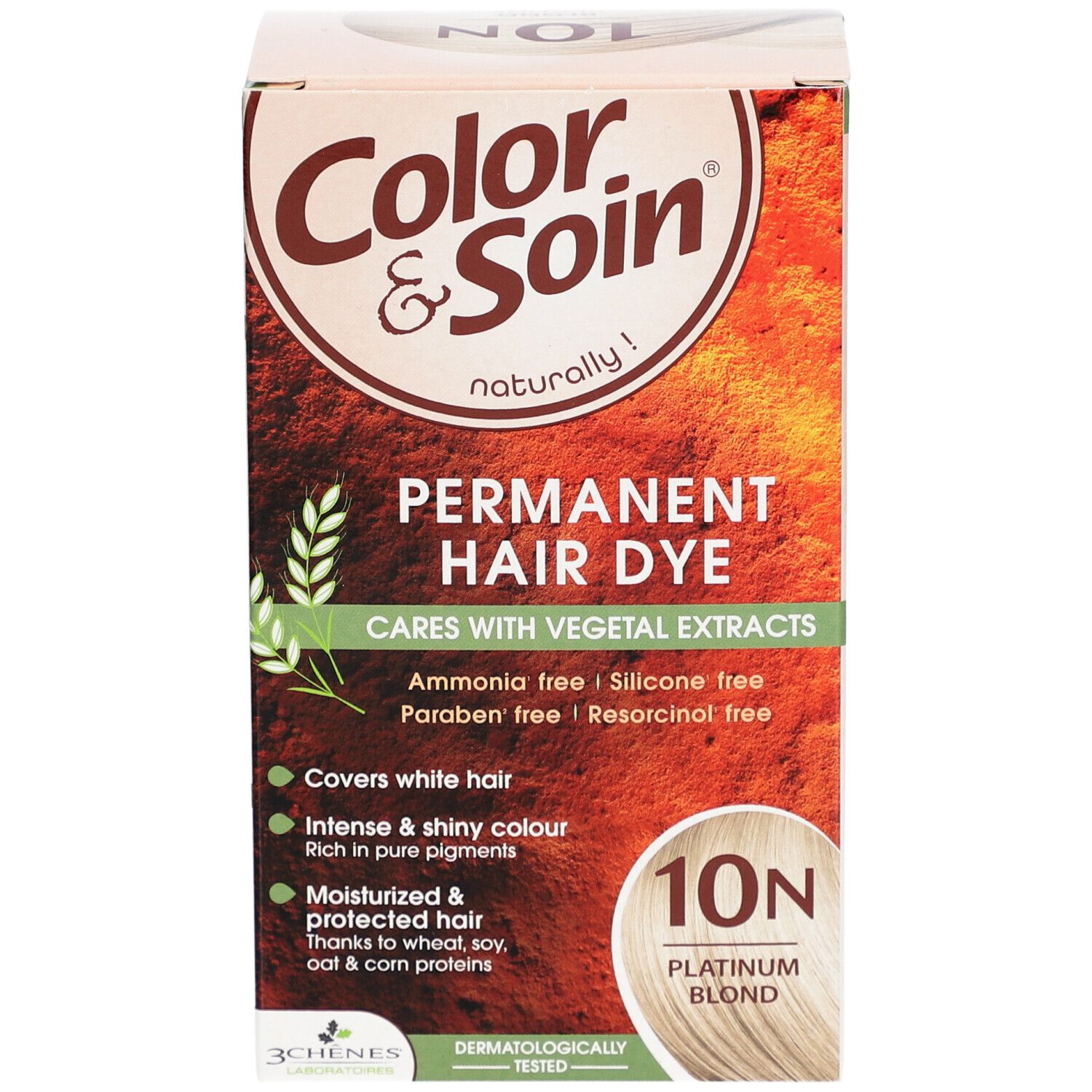 Boîte de coloration capillaire. Inscription: Color & Soin, Permanent Hair Dye, 10N Blond Platine. Contient des extraits végétaux. Couvre les cheveux blancs.