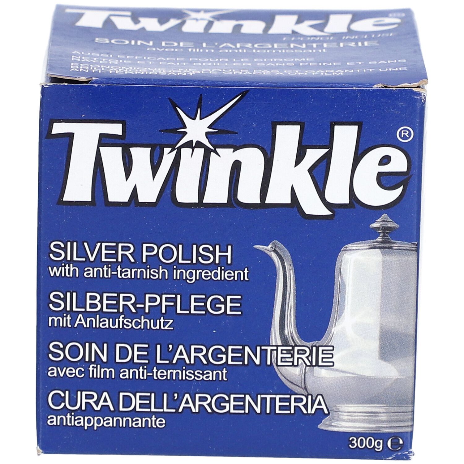 Blauwe doos met "Twinkle" logo en productnaam. Bevat zilverpoets met anti-aanslag. Afbeelding van een kan.