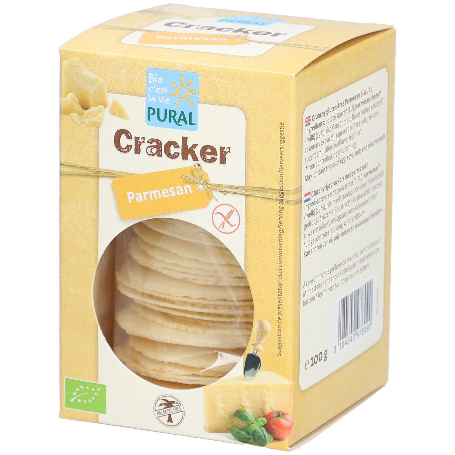 Boîte jaune "PURAL Cracker Parmesan". Fenêtre ronde montrant des crackers. Labels bio et sans gluten.