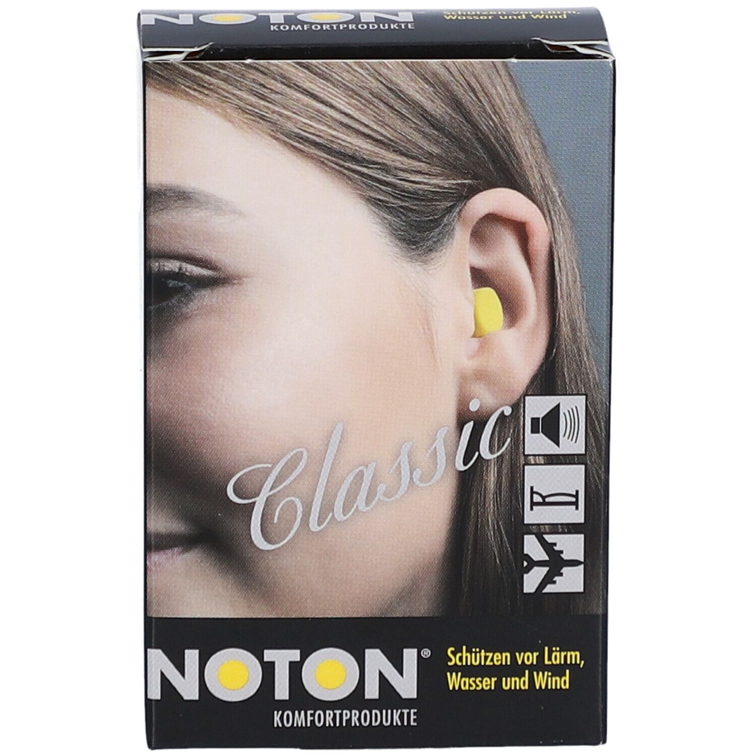 Doos met gele oordopjes. Opschrift: NOTON, Classic, Komfortprodukte. Vrouw met oordopje in oor.
