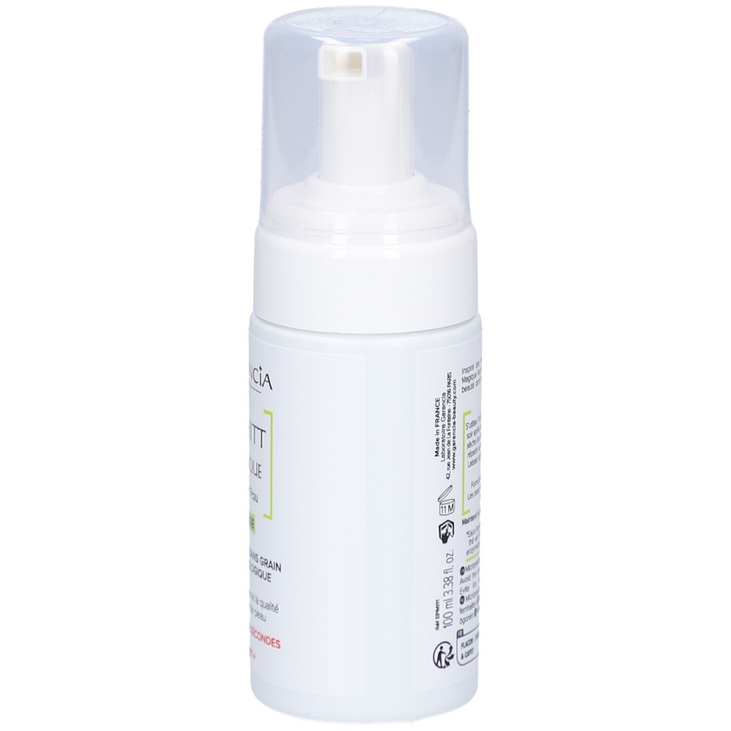 Witte fles met pomp. Opschrift: GARANCIA, Pschitt Magique, Nouvelle Peau, Visage. Franse tekst.