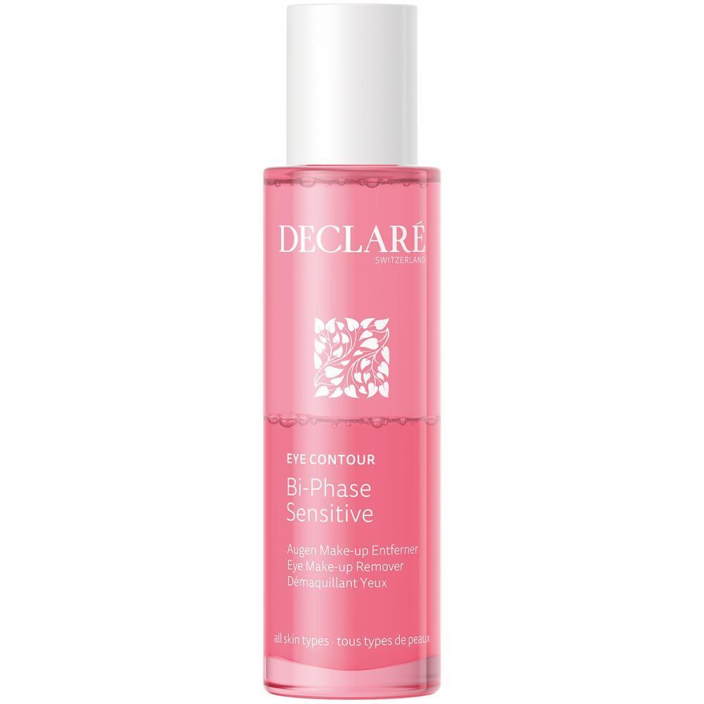 Démaquillant yeux biphasé. Bouchon blanc, liquide rose. Texte: DECLARE, EYE CONTOUR, Bi-Phase Sensitive.