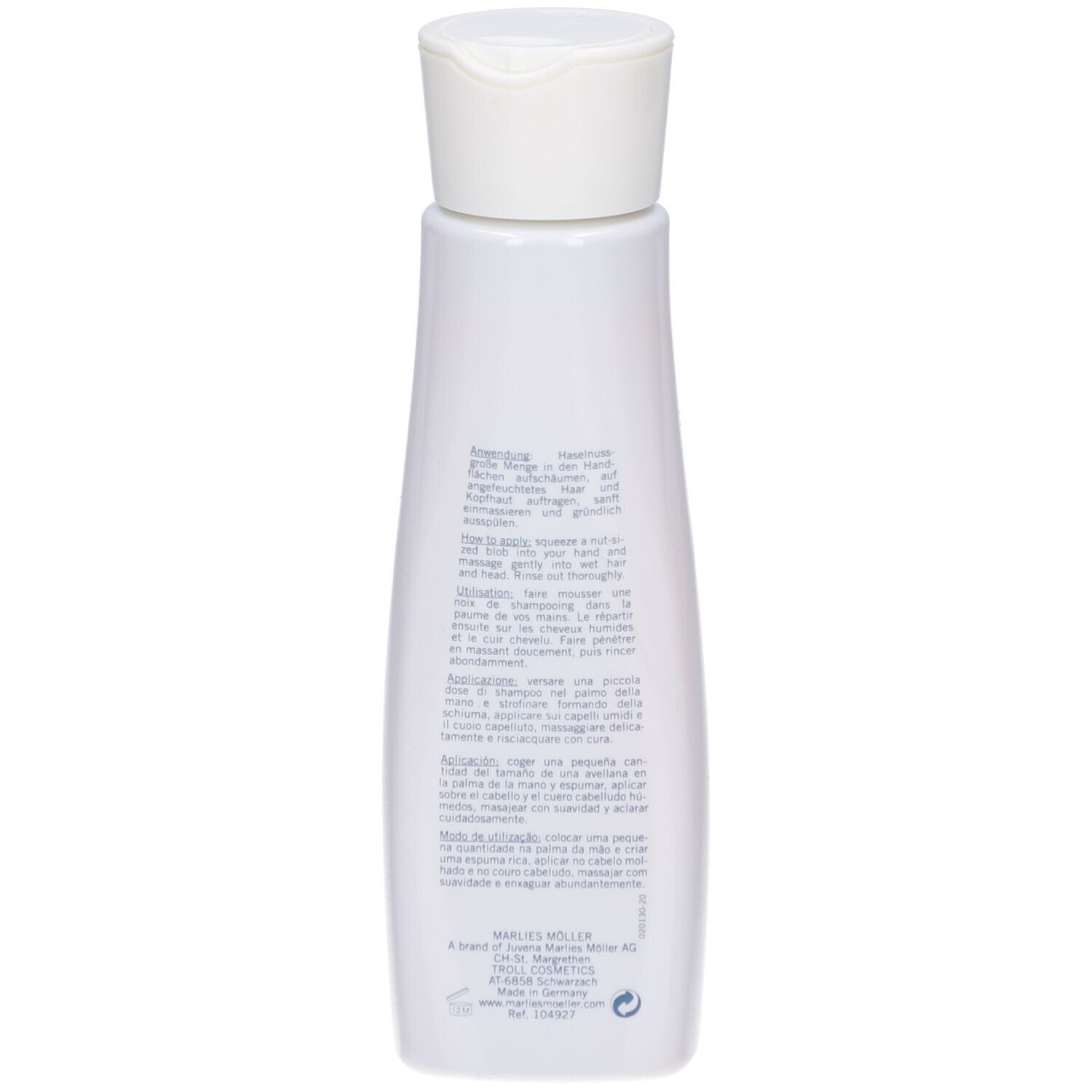 Dos du flacon de shampooing. Texte en plusieurs langues. Marlies Müller, daily repair shampoo.