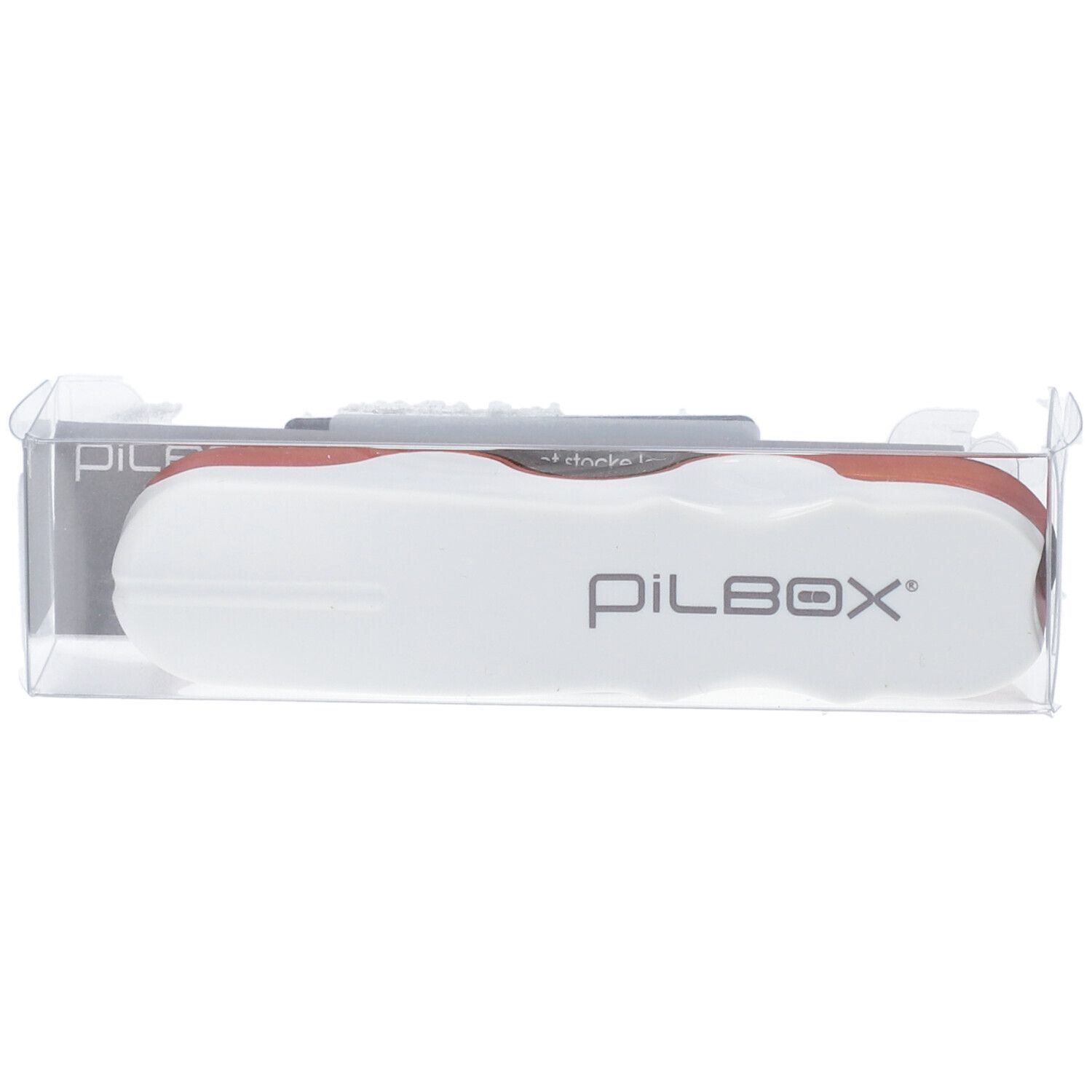 Tablettensnijder in transparante verpakking. PILBOX logo zichtbaar.