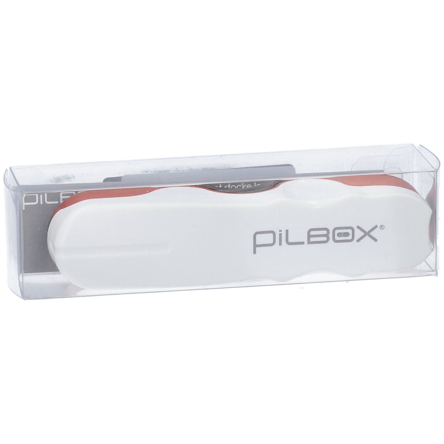 Tablettensnijder in transparante verpakking. PILBOX logo zichtbaar.