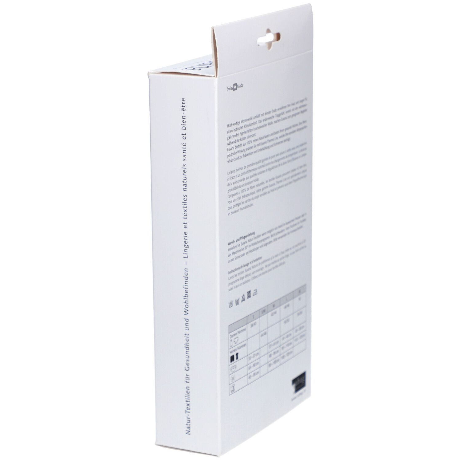 Vue latérale de l'emballage du produit. Texte en plusieurs langues. Tableau des tailles avec mesures.