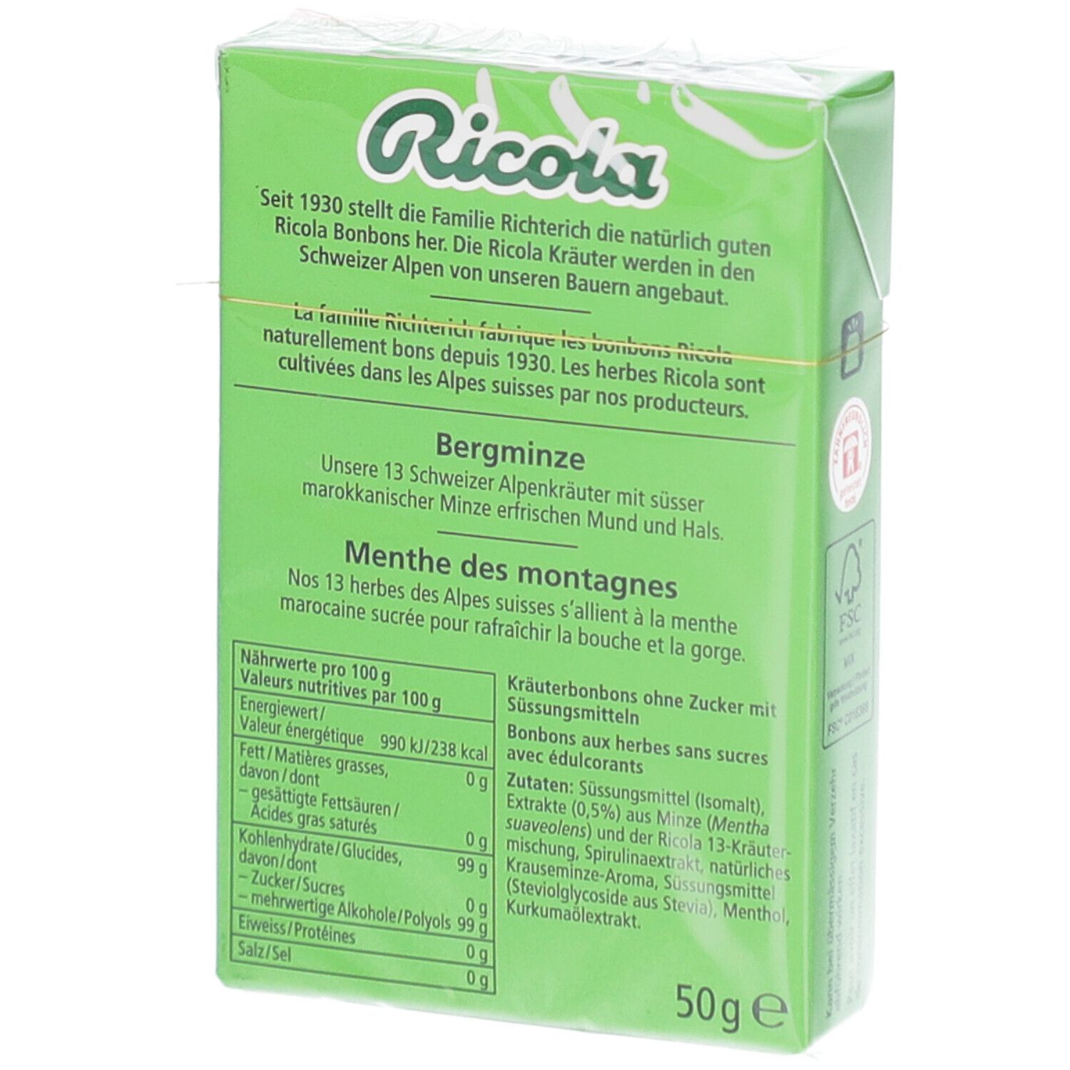 Achterkant van de groene Ricola-verpakking. Tekst in het Duits en Frans. Voedingswaarde en ingrediëntenlijst.
