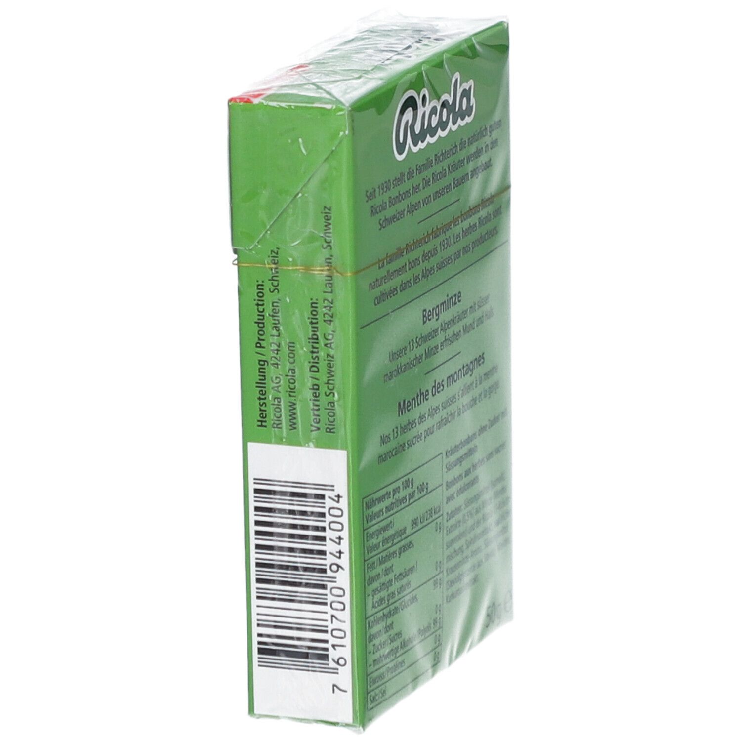 Zijaanzicht van de groene Ricola-verpakking. Barcode en tekst. Fabrikant informatie.