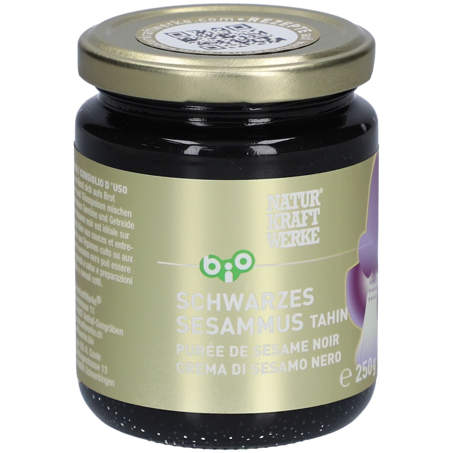 Pot de purée de sésame noir. Couvercle doré, étiquette avec nom du produit et label bio.