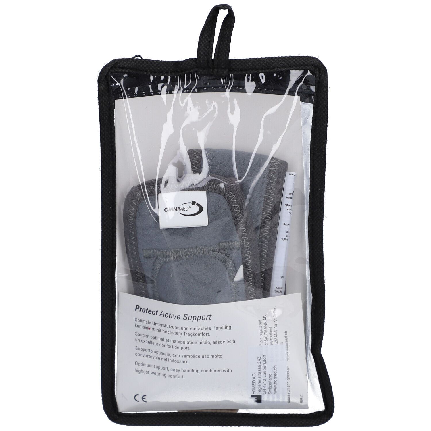 Bandage dans un étui noir. Visibles: logo, nom du produit, texte multilingue. Marquage CE.