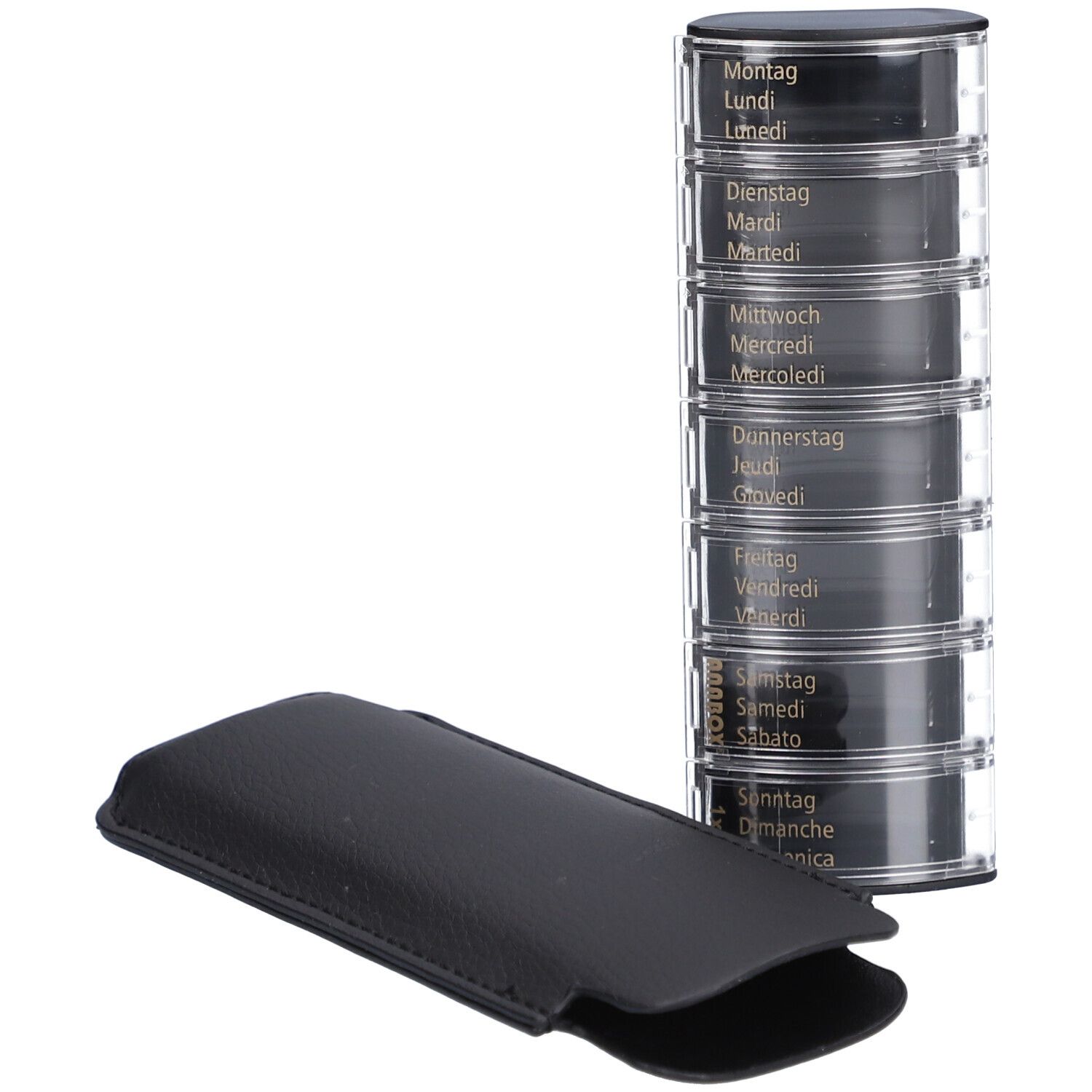 Medicijndispenser met 7 vakken, met weekdagen. Zwarte leren etui ernaast.
