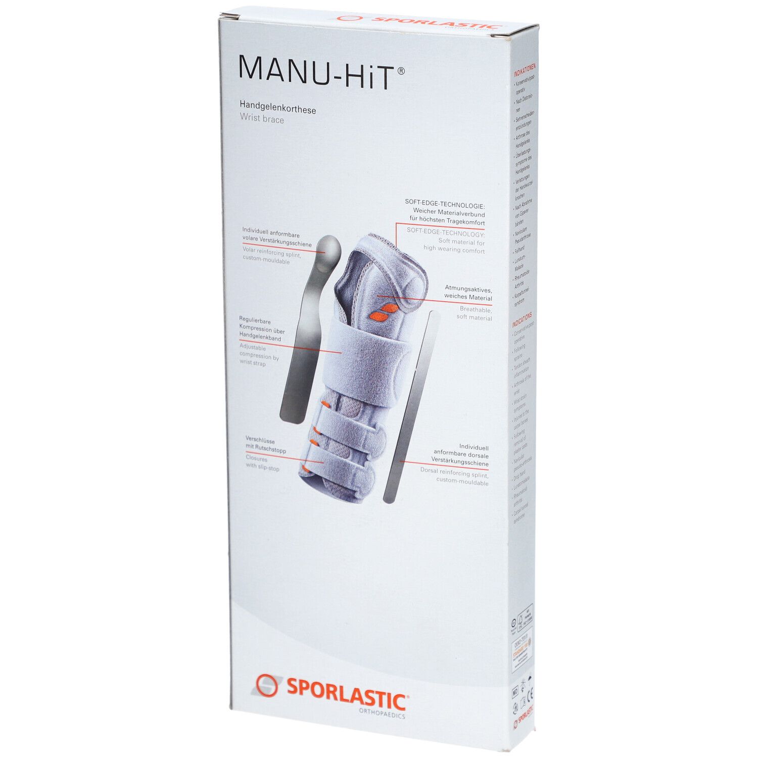 Verpakking van de polsbrace. Opschrift: MANU-HIT, SPORLASTIC. Afbeelding: brace en pols. Tekst: SOFTTECHNOLOGIE.