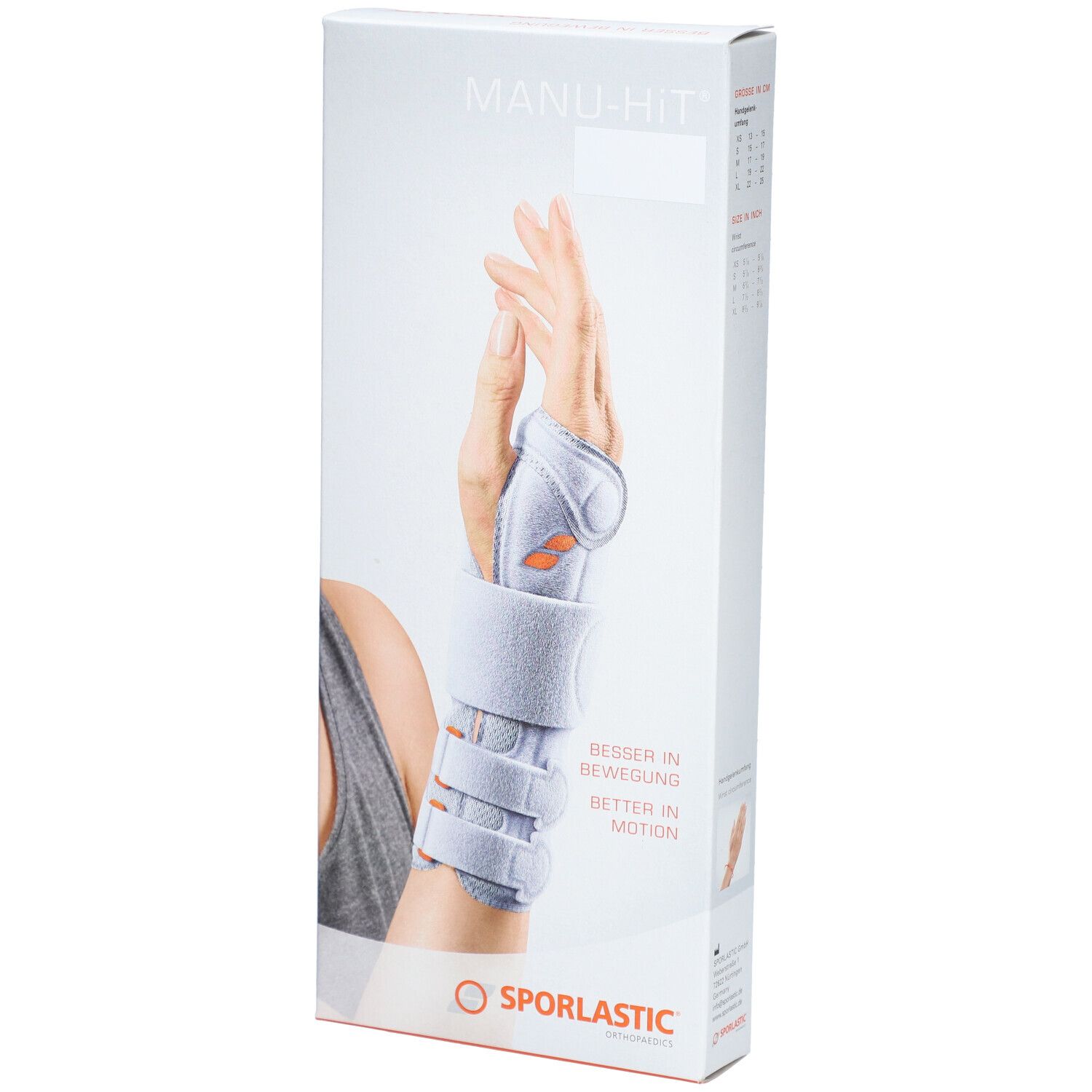 Verpakking van de polsbrace. Opschrift: MANU-HIT, SPORLASTIC. Afbeelding van een hand met brace.