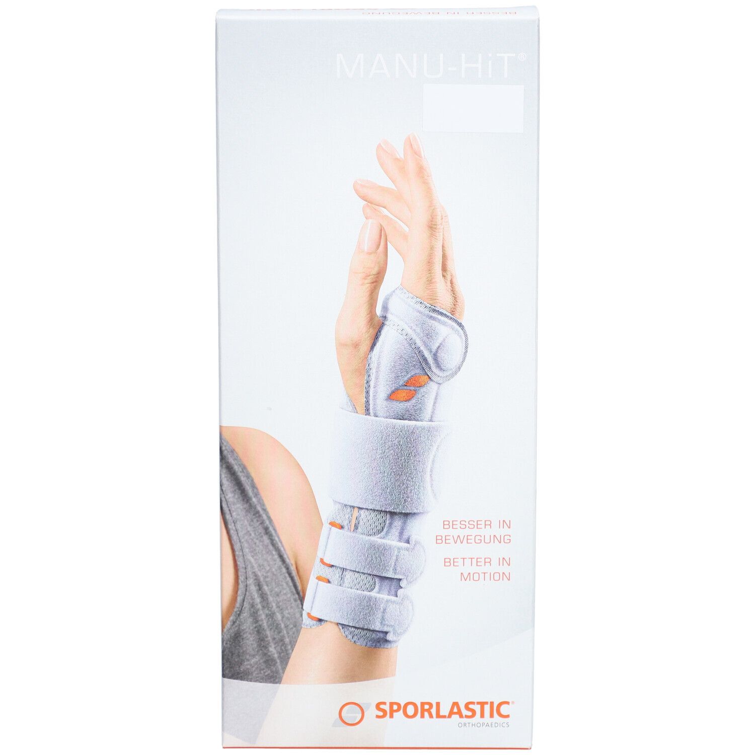 Verpakking van de polsbrace. Opschrift: MANU-HIT, SPORLASTIC. Afbeelding van een hand met brace.