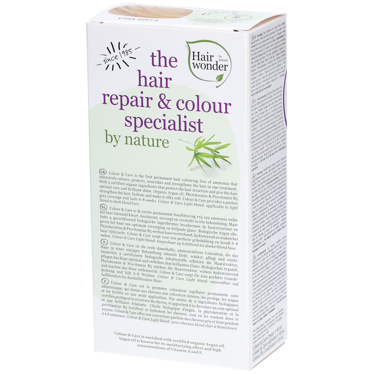 Verpakking haarverf. Opschrift: the hair repair & colour specialist by nature. Tekst en logo. Zijaanzicht.