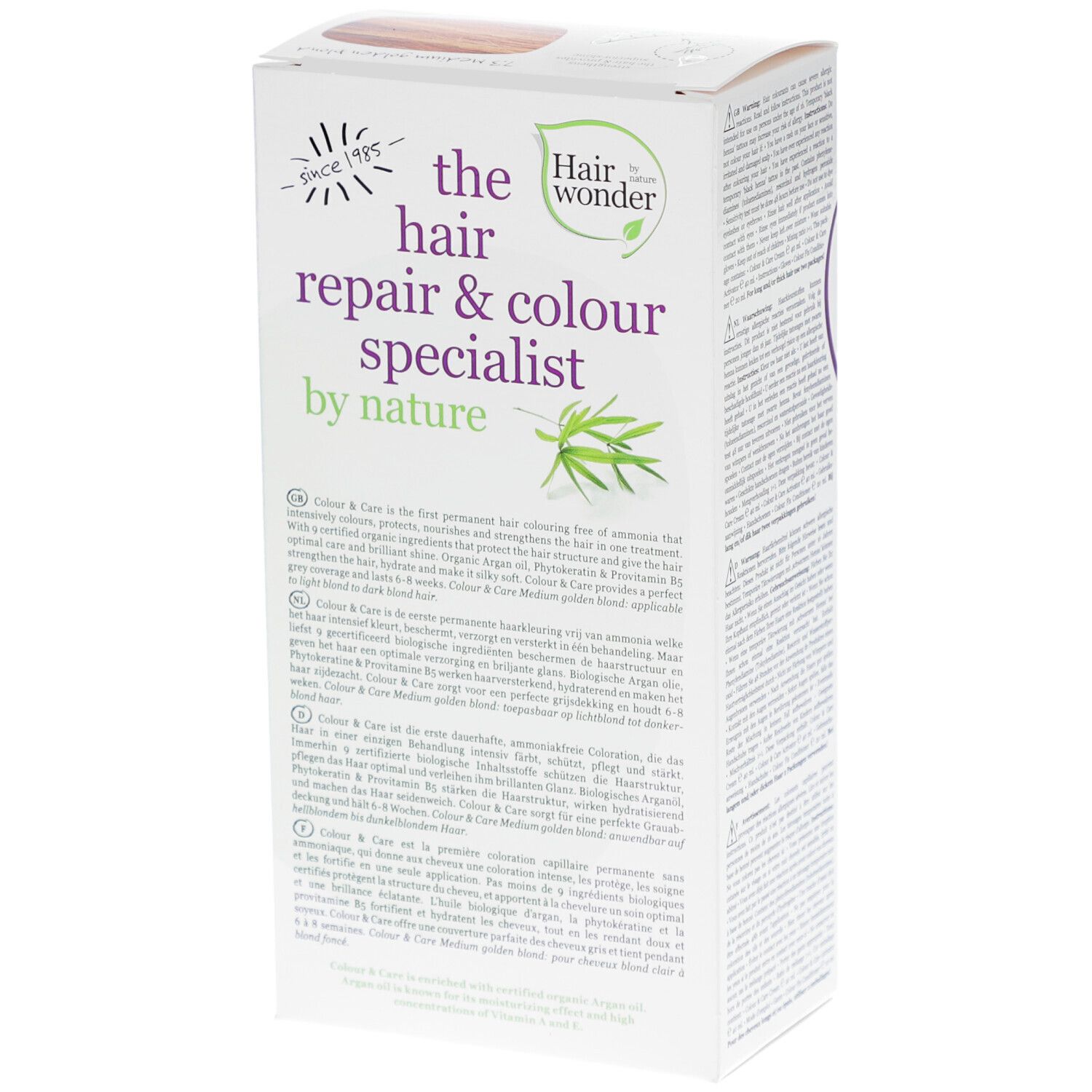 Haarkleurdoos, zijaanzicht. Opschrift: the hair repair & colour specialist by nature. Tekst in meerdere talen.