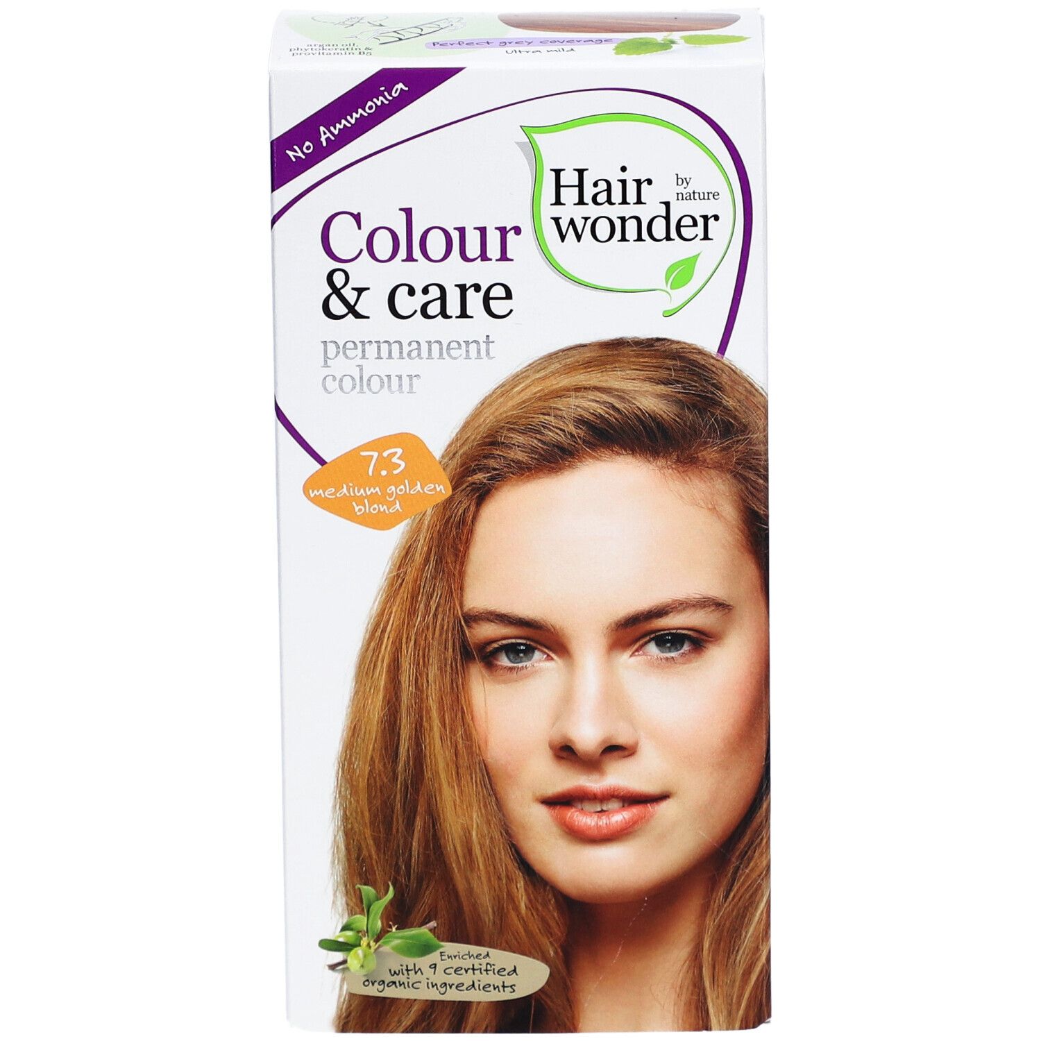 Haarkleurdoos. Opschrift: Colour & Care, 7.3 medium goudblond. Afbeelding van een vrouw met goudblond haar.