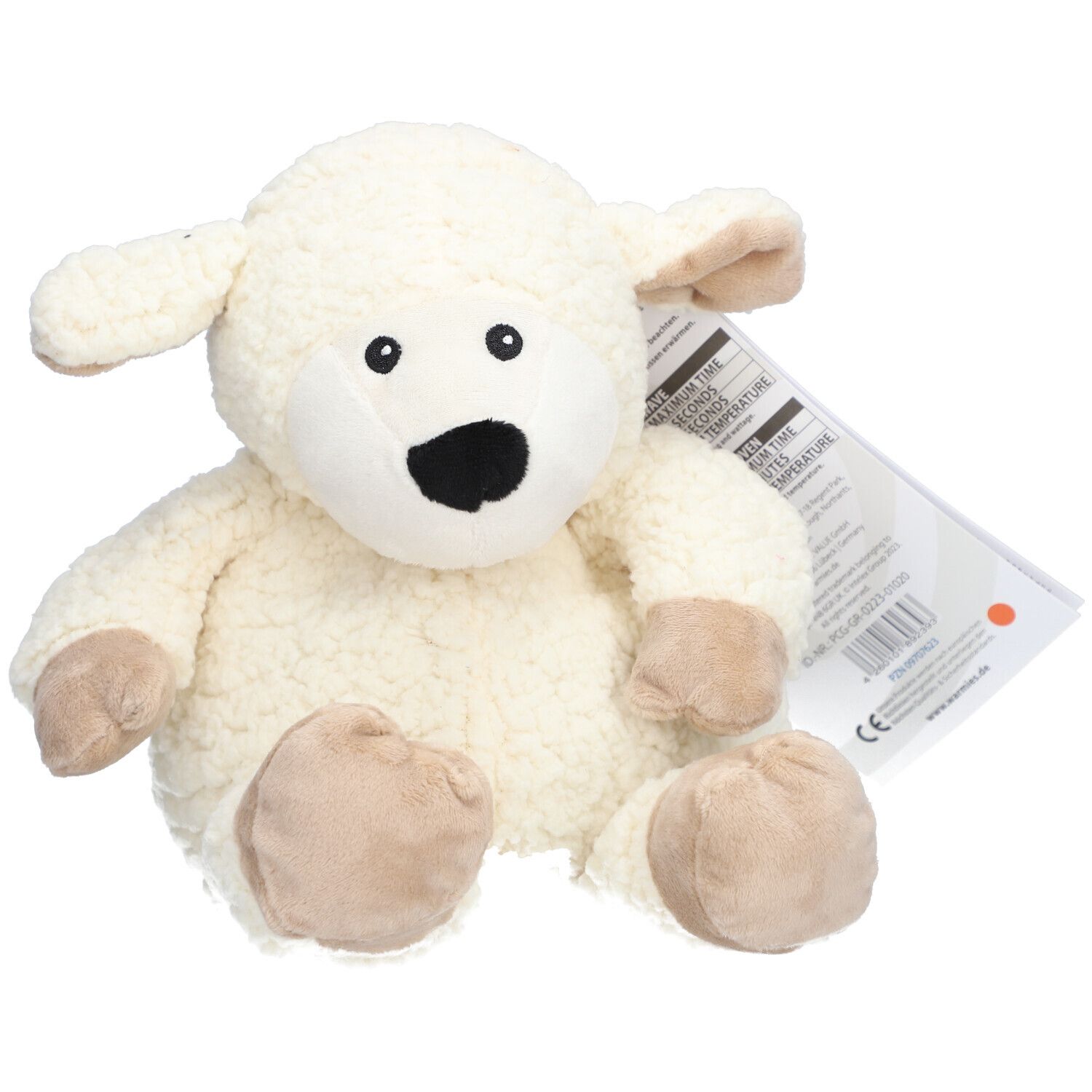 Peluche mouton blanc, bouche noire, pieds beiges. Étiquette avec informations produit.