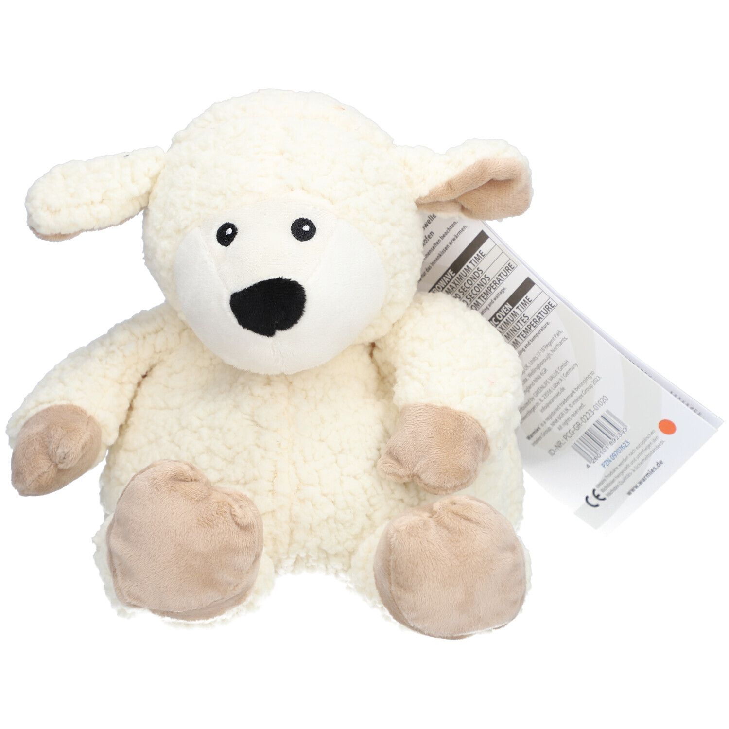 Peluche mouton blanc, bouche noire, pieds beiges. Étiquette avec informations produit.