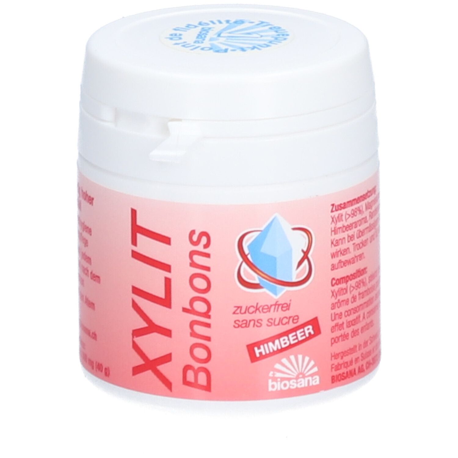 Boîte blanche et rose "XYLIT Bonbons Himbeer". Logo diamant bleu. "Sans sucre". Ingrédients et composition.