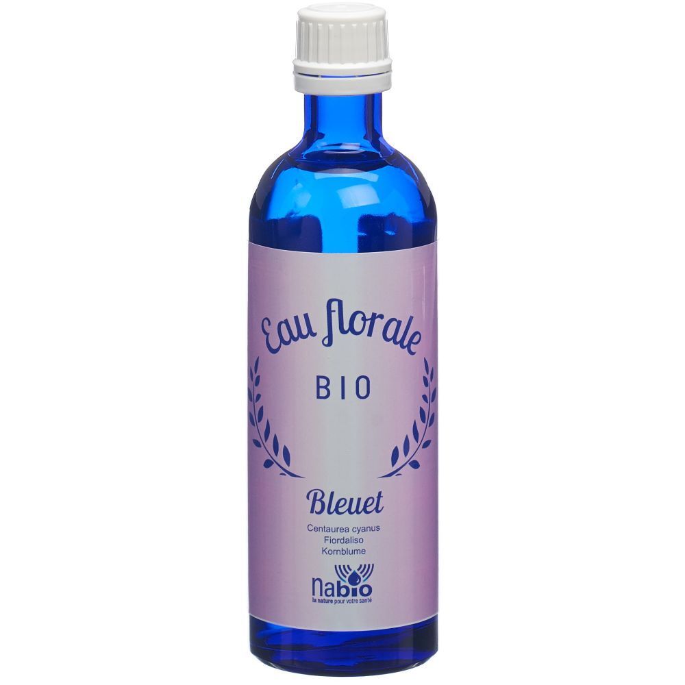 Blauwe glazen fles met witte dop. Etiket met "Eau florale BIO" en "Bleuet". Merk: nabio.