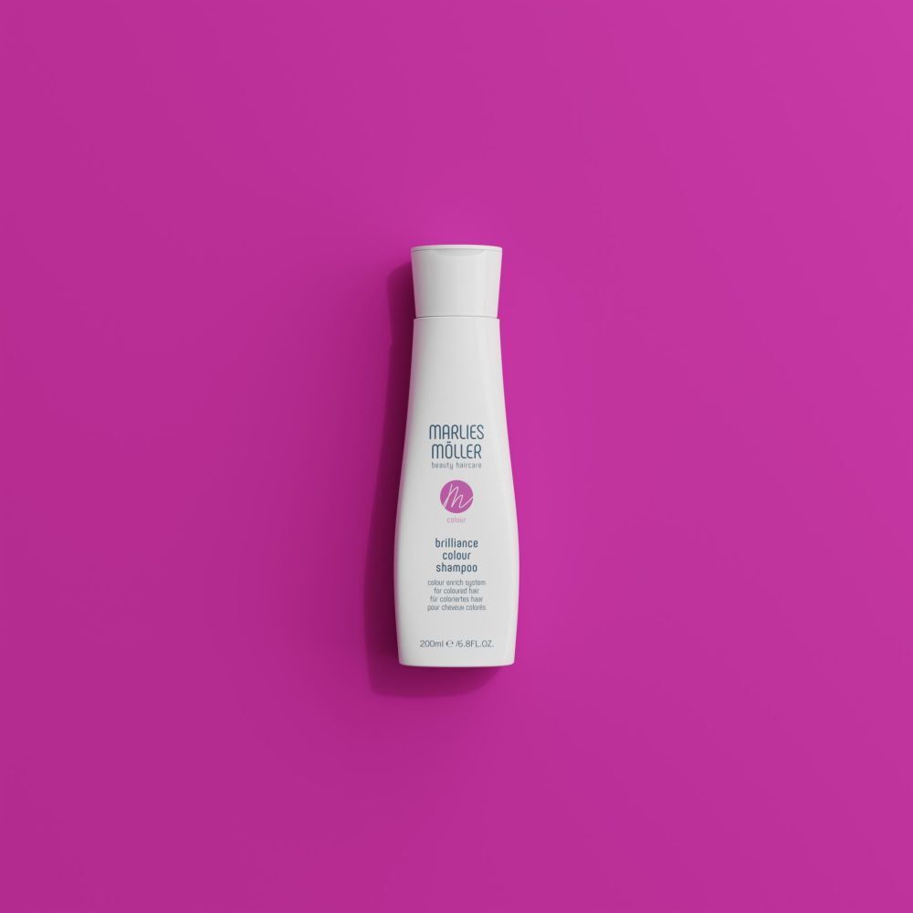 Marlies Möller shampoo op roze achtergrond. Voor gekleurd haar.