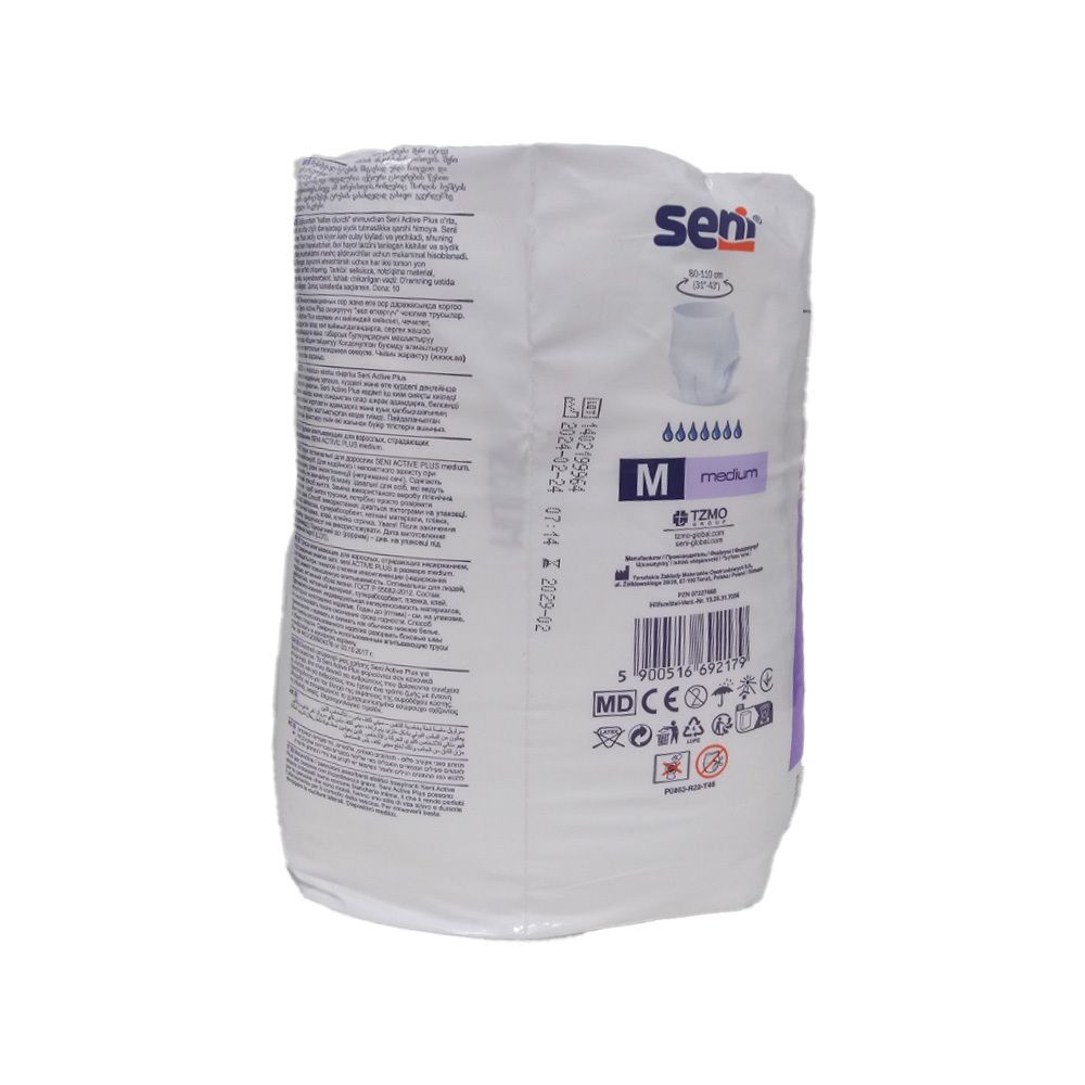 Achterkant van de verpakking SENI Active Plus Pants M. Witte verpakking met tekst en logo. Zijaanzicht.