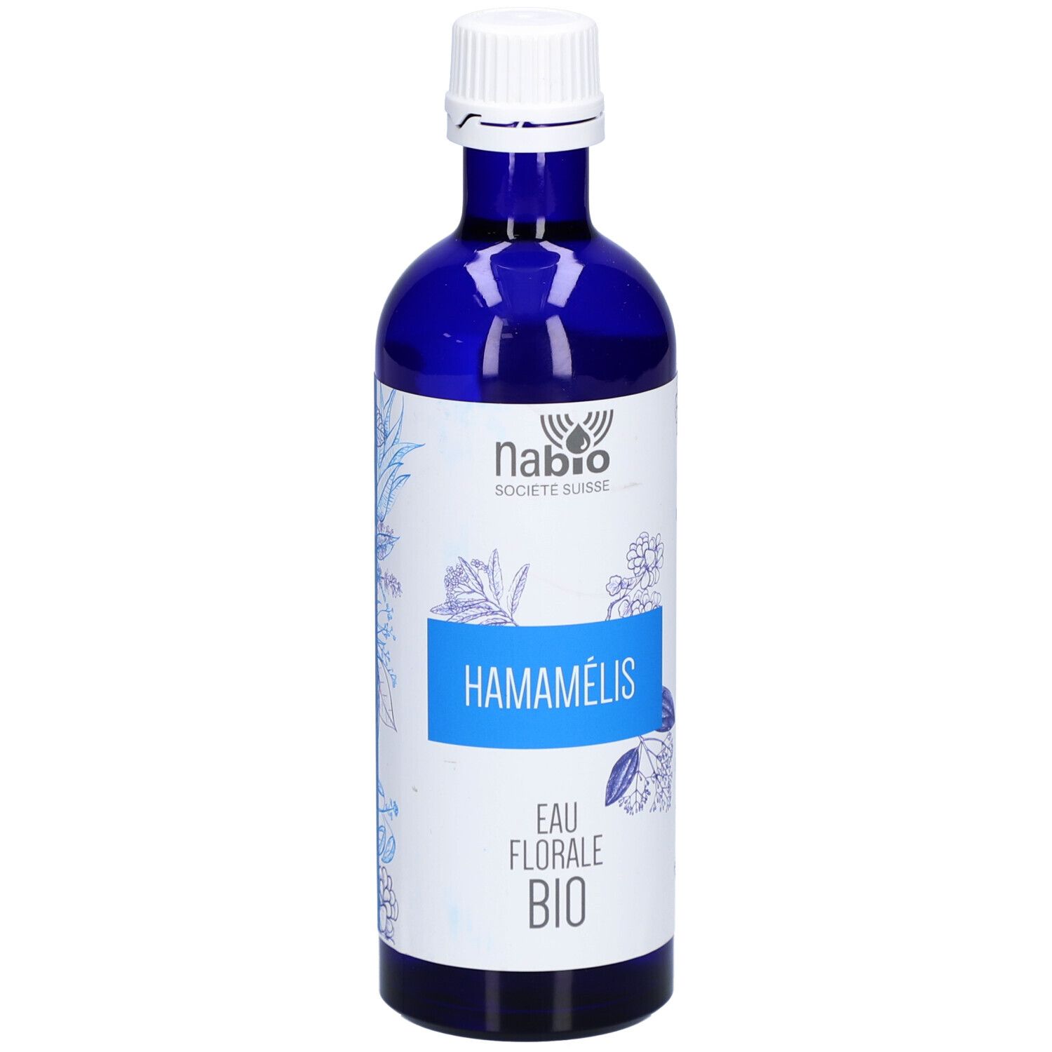 Flacon en verre bleu avec bouchon blanc. Inscription: HAMAMÉLIS, EAU FLORALE BIO. Logo NABIO SOCIETE SUISSE.
