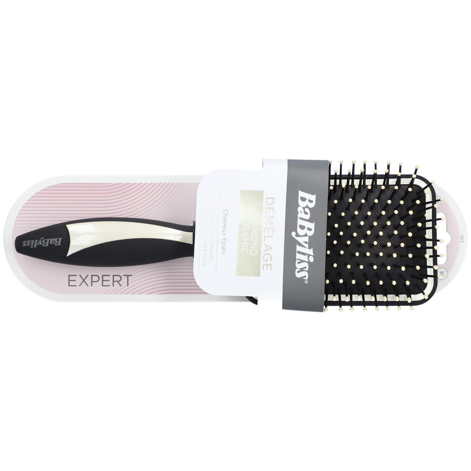 Brosse à cheveux BABYLISS Expert. Manche noir, brosse rectangulaire avec picots blancs. Emballage avec nom du produit.