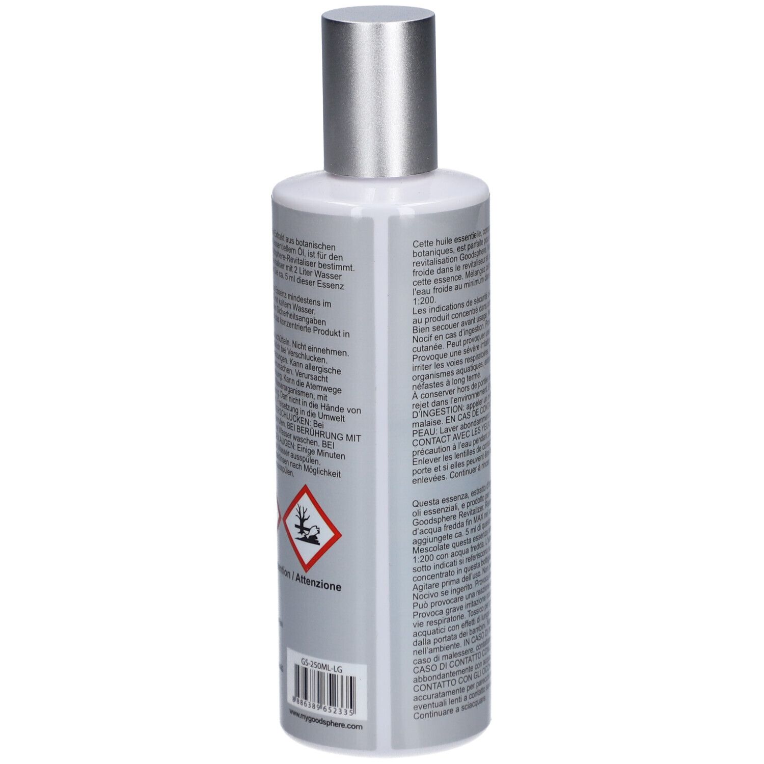 Achterkant van de fles. Tekst in meerdere talen. Gevaarsymbool. Zilveren dop.